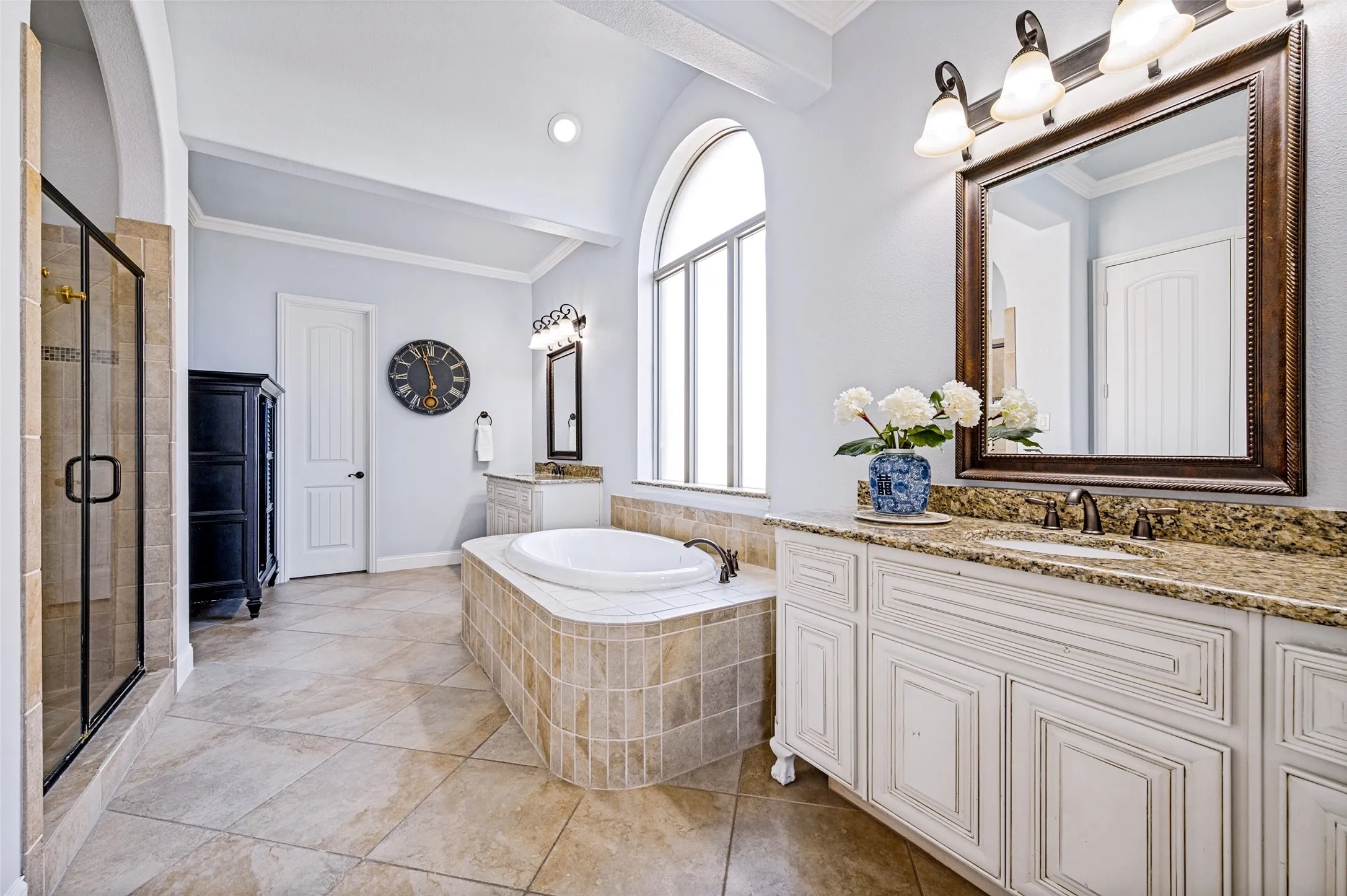 Seperate vanities and a walk in closet