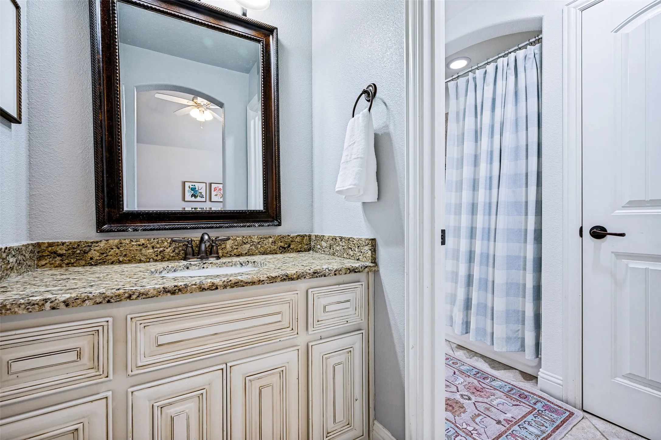 Each bedroom has its own sink and shares the shower/tub toilet