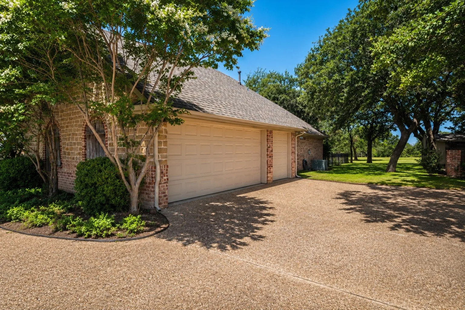 2 car garage with third stall for golf cart