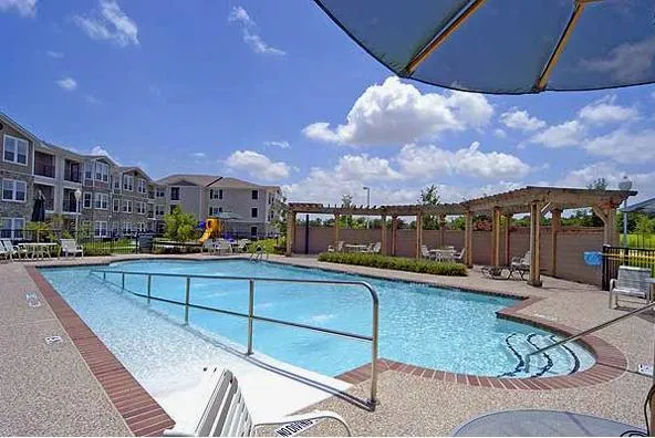 The community pool offers a refreshing place to relax, socialize, and enjoy the outdoors while connecting with neighbors and embracing an active lifestyle.