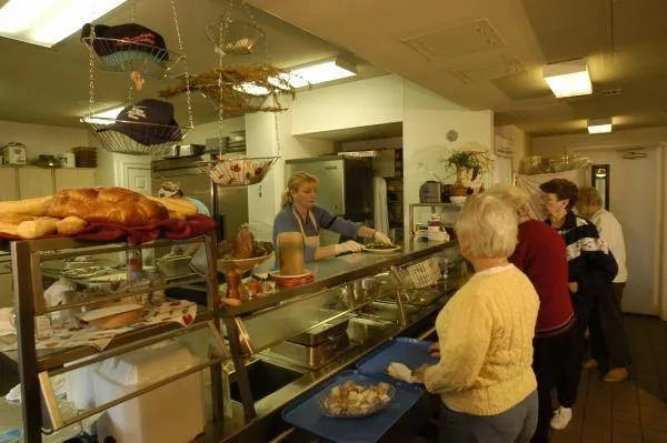 The on-site restaurant offers convenient dining just steps from home, with delicious meals available for purchase in a welcoming setting perfect for socializing.
