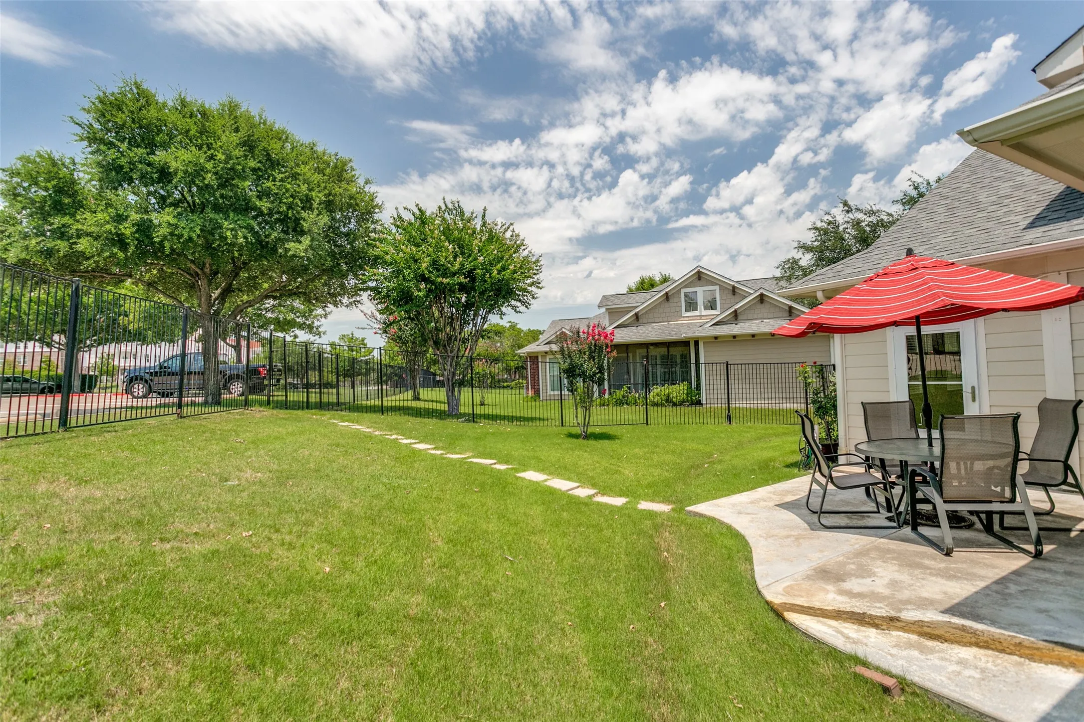 A stone pathway in the backyard leads directly to the community clubhouse and amenity center, providing a rare and exceptional convenience. Enjoy effortless access to the community’s amenities with no need to drive.