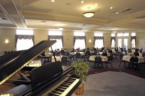 The community room is the hub of neighborhood life, offering a lively calendar of social events, concerts, dancing, games, celebrations, and gatherings that keep residents active, connected, and engaged.