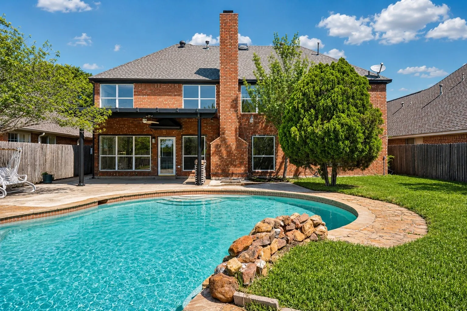 Private backyard retreat with pool and plenty of room to entertain.
