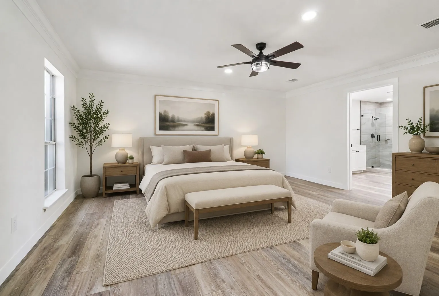 Private downstairs primary suite with generous space and natural light.