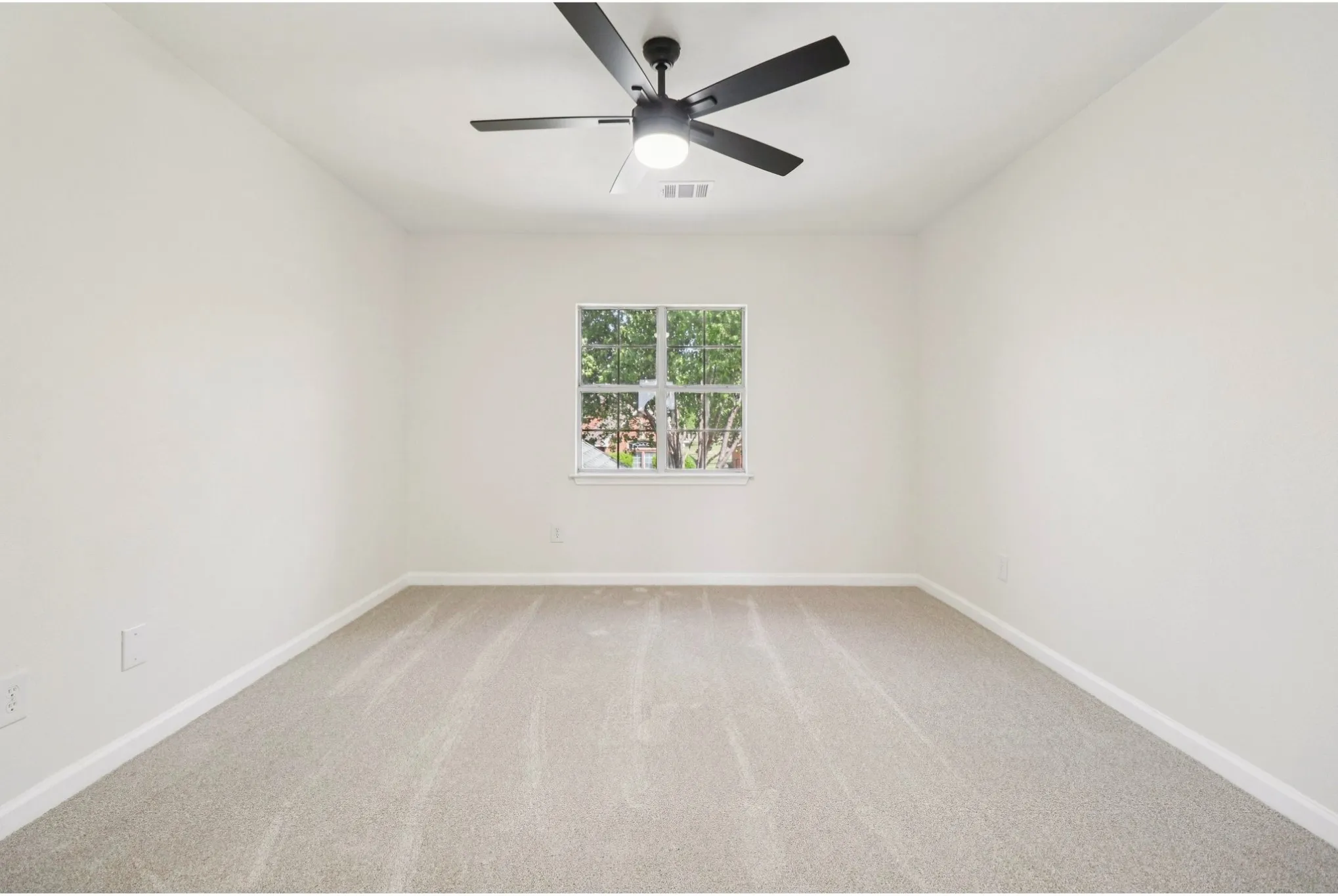 Dedicated home office/5th bedroom offering the perfect work-from-home space.