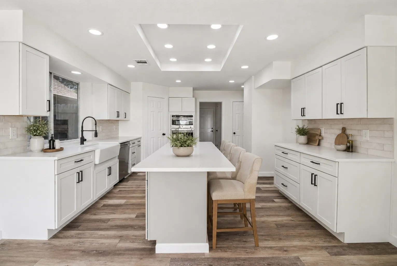 Completely remodeled kitchen with quartz countertops and oversized island.