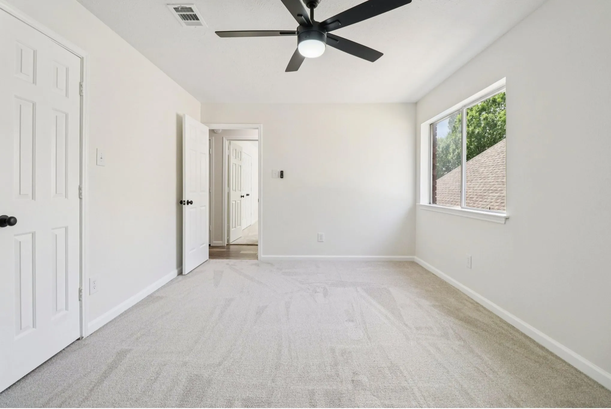 Spacious secondary bedrooms with generous closets.
