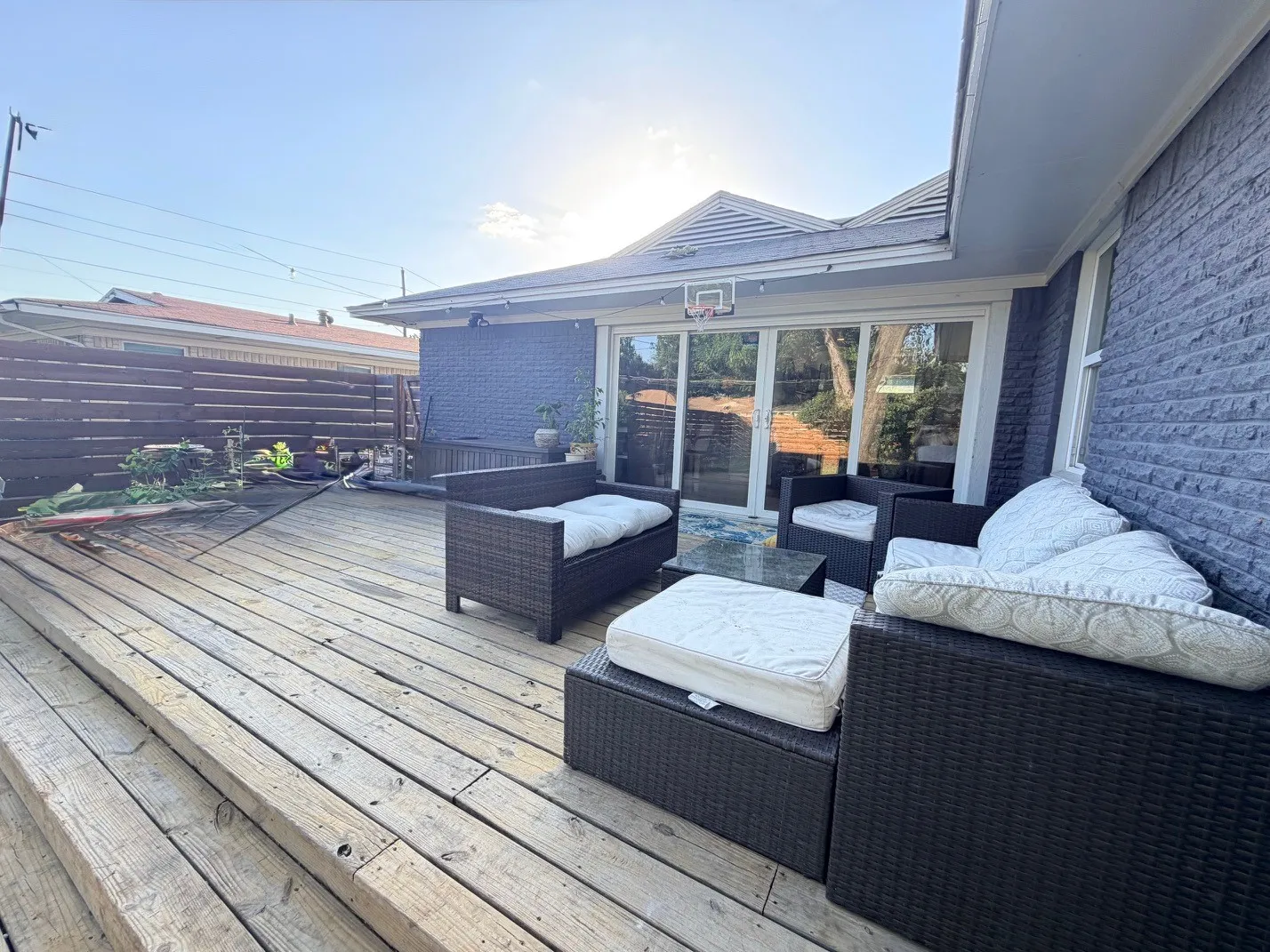 Expansive outdoor deck featuring wood planking and multi-level design