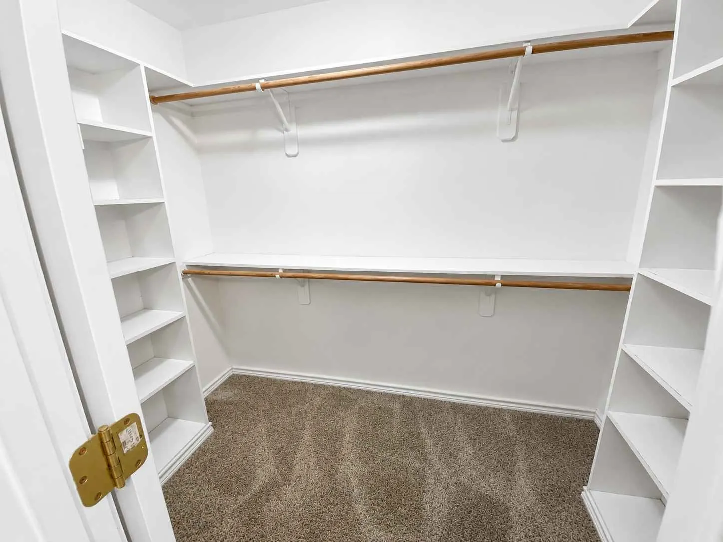 Primary Bedroom walkin closet in ensuite bathroom.