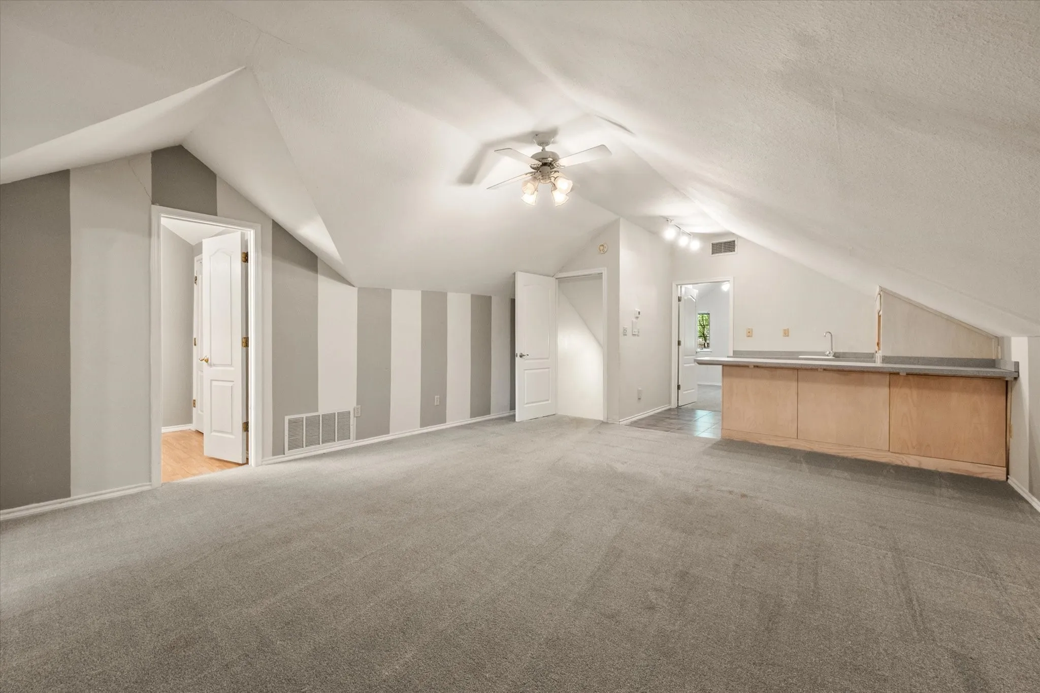 The upstairs bonus room includes a kitchenette!
