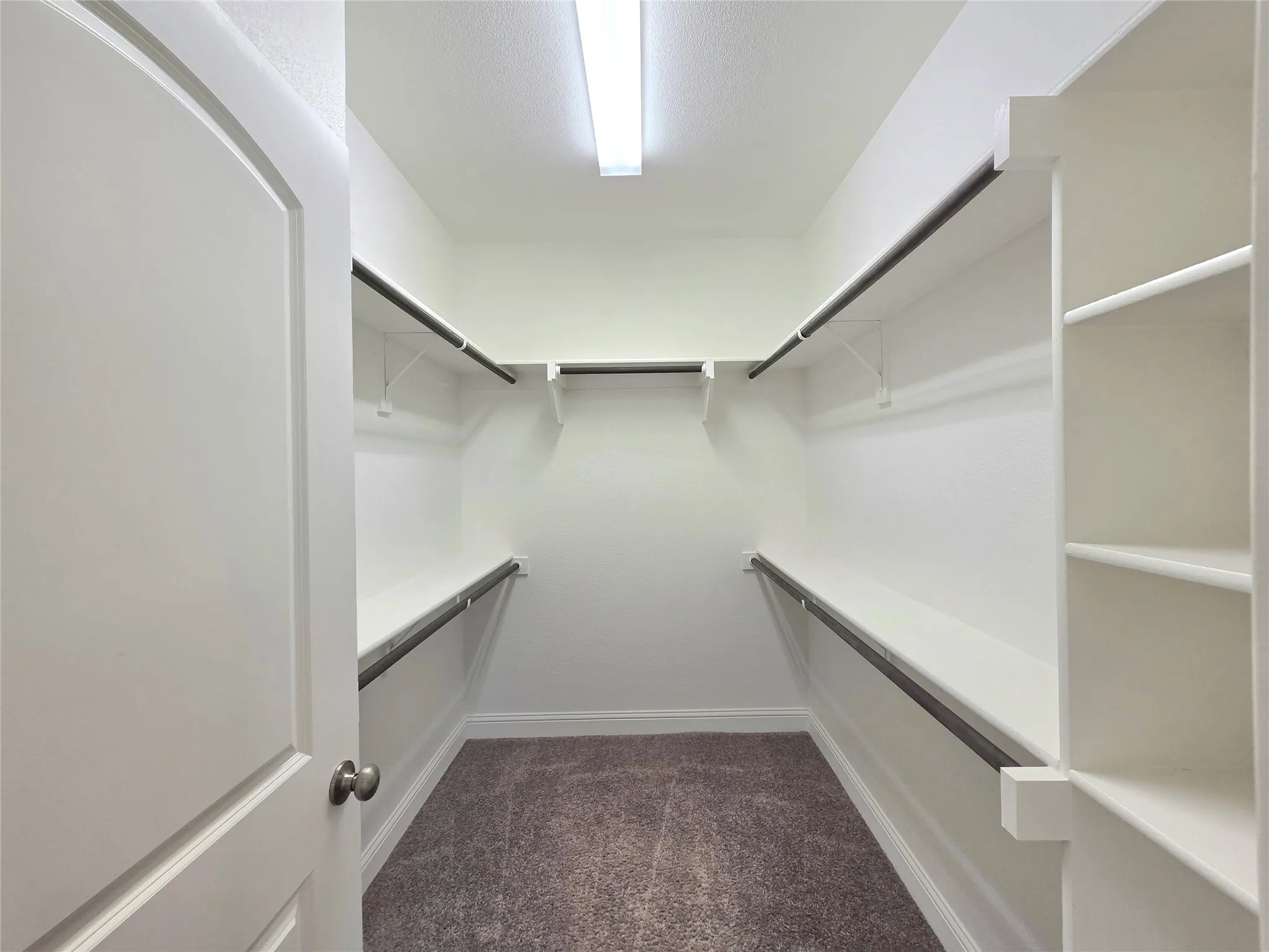 1 of the 2 closets in primary suite
