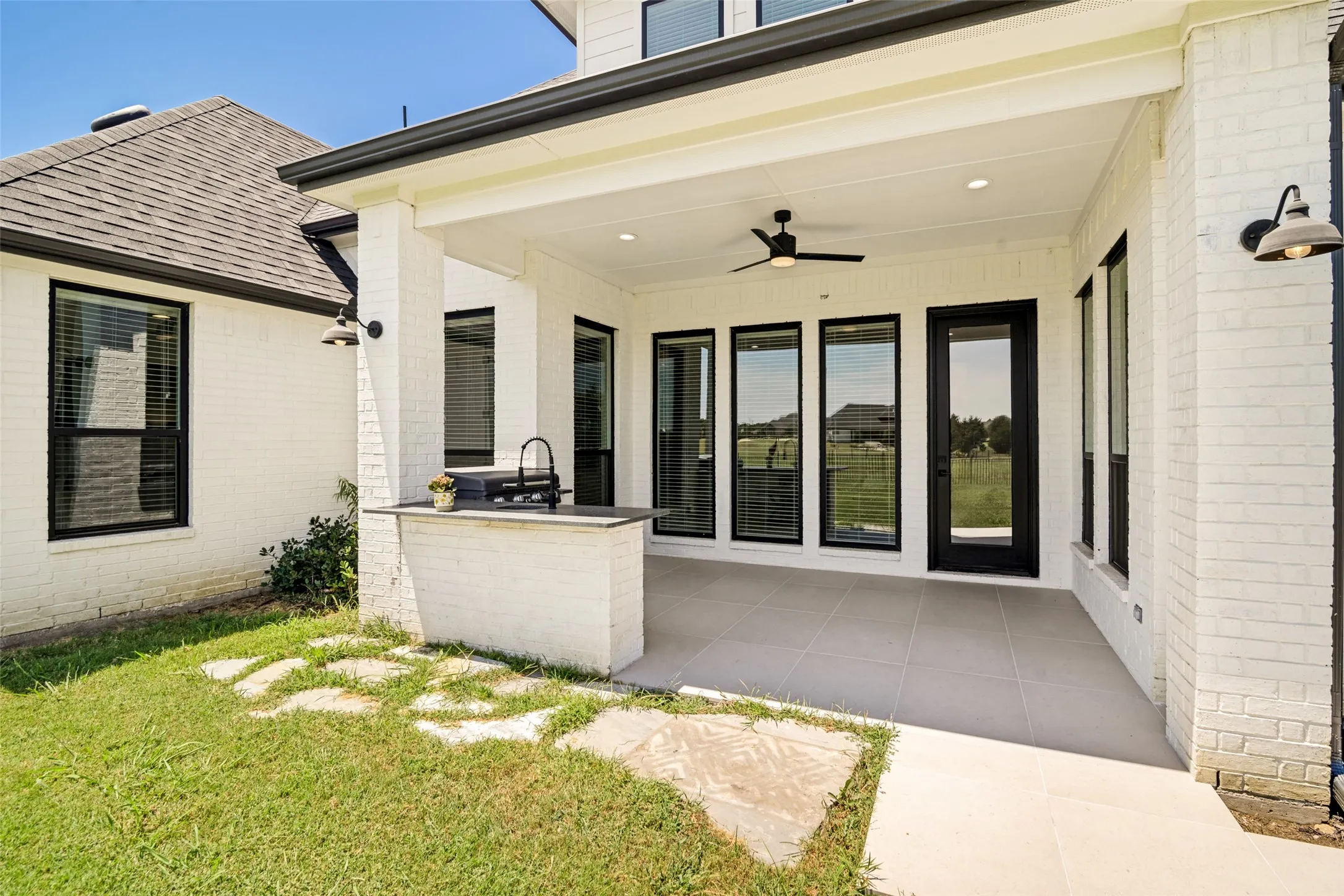 Covered patio with built-in grill
