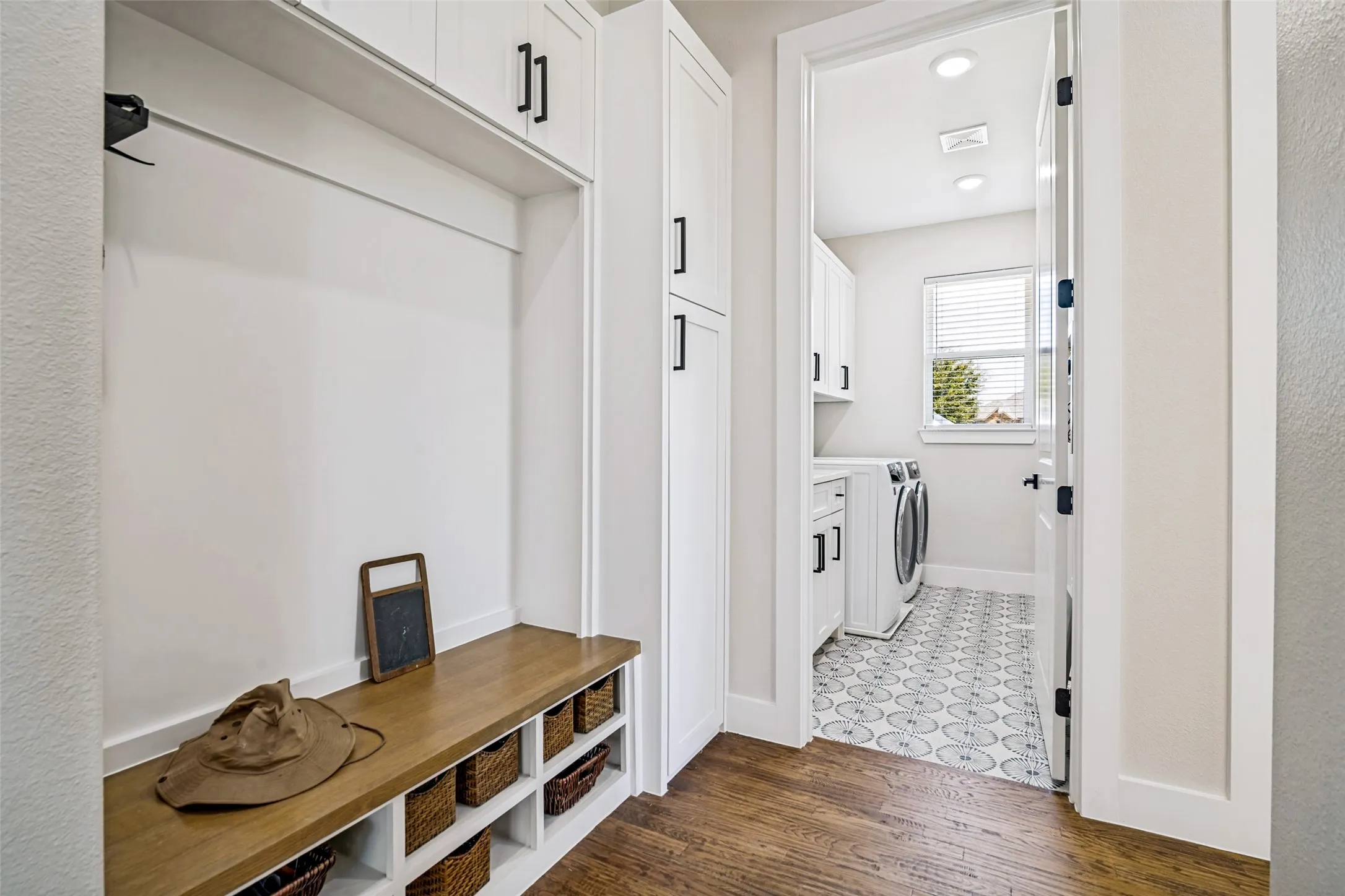 Mud room off of garage entry with easy access to laundry room