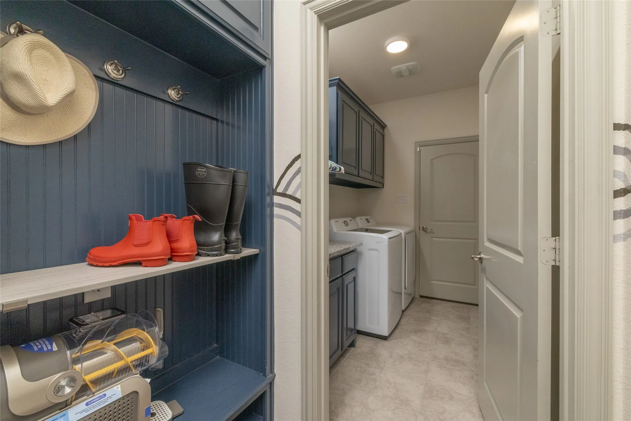 Full size laundry area with deep well sink