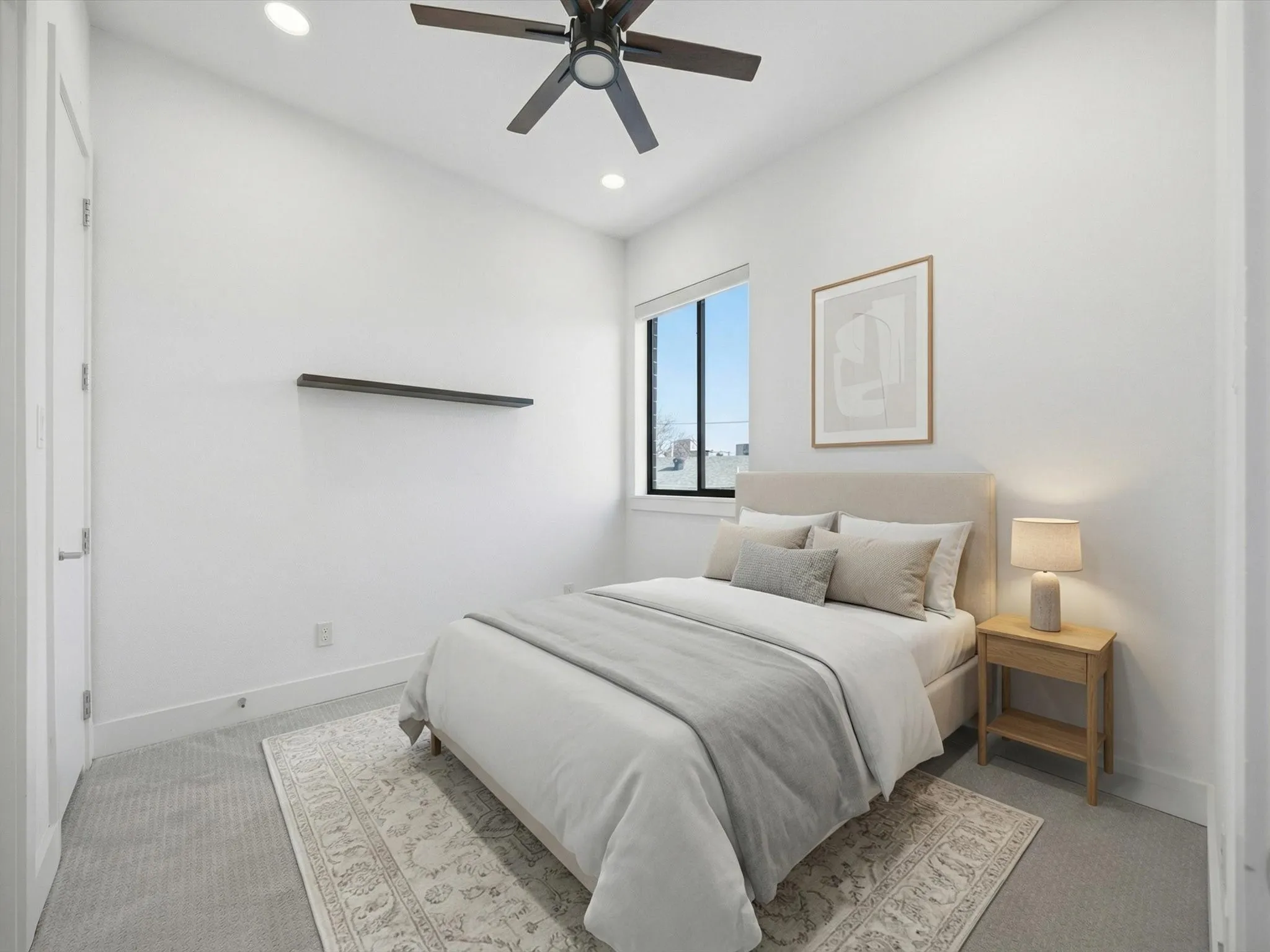 Bedroom featuring light colored carpet, a ceiling fan, and recessed lighting