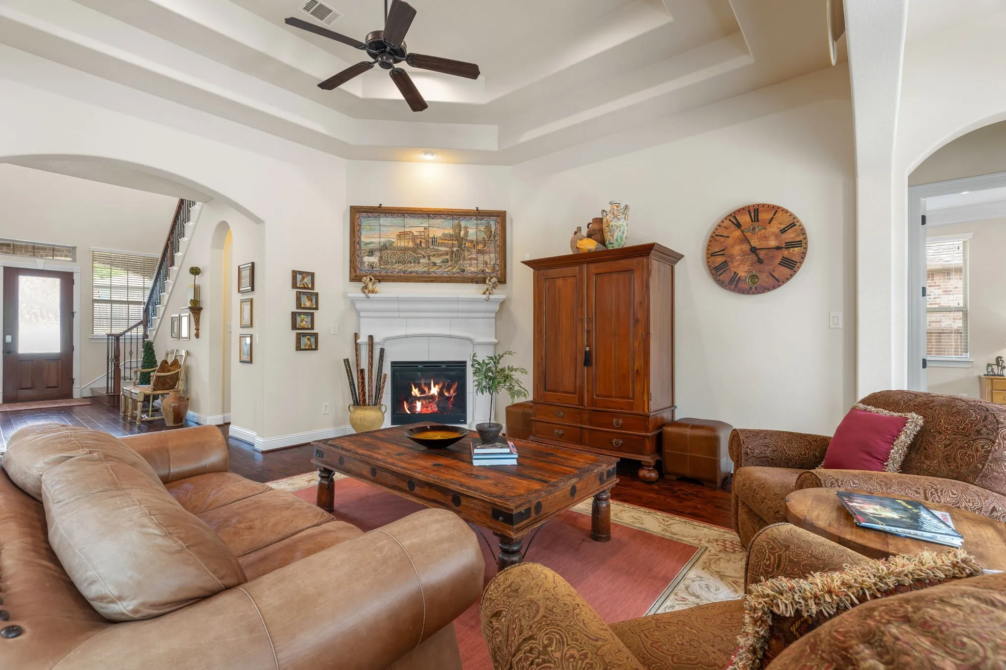 This room has outstanding views to the backyard paradise and is open to the kitchen.