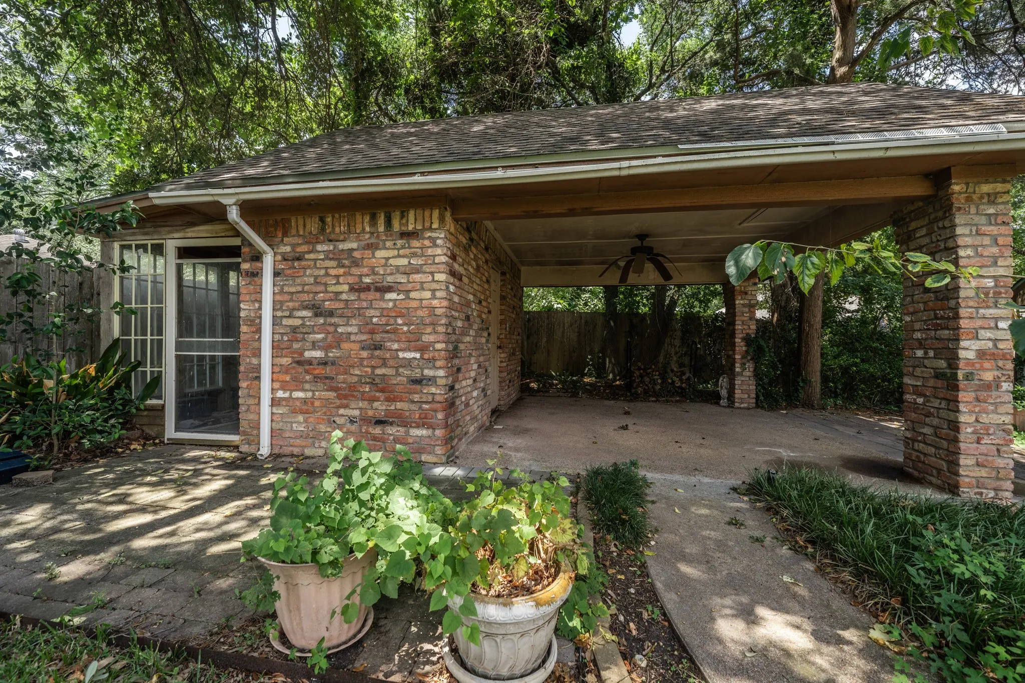 Storage building with storeage area, covered patio and  small sun room. Has Electricity.