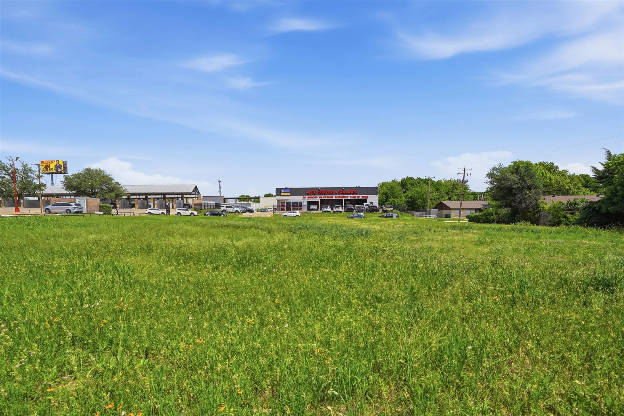 Expansive undeveloped land parcel featuring natural grass coverage