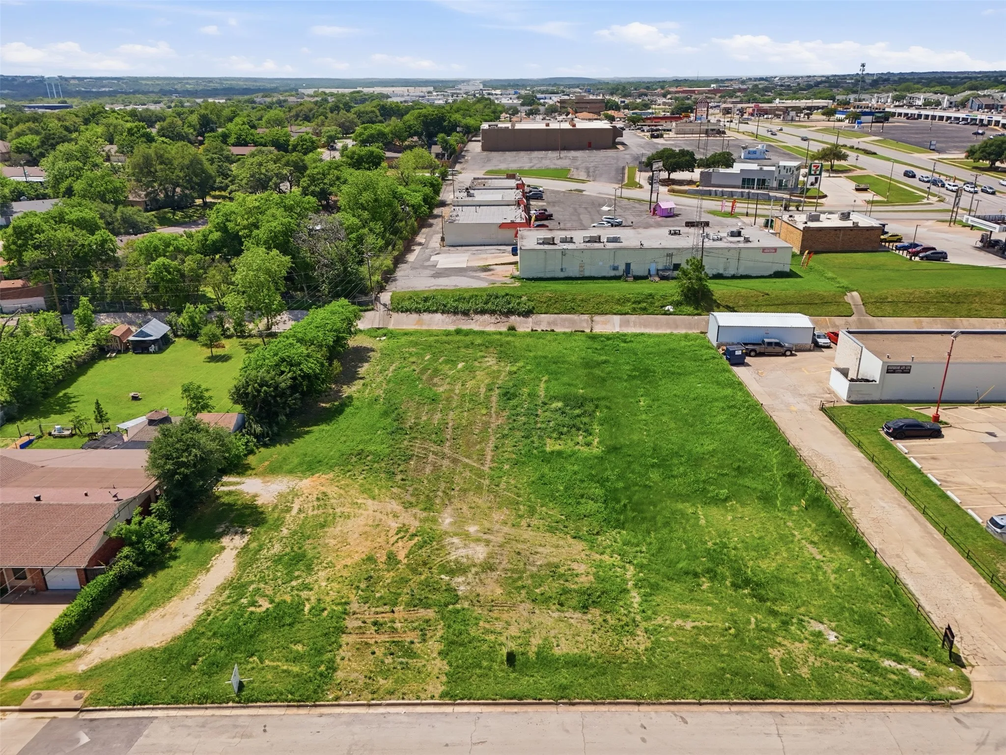 Expansive grass-covered lot featuring a level topography