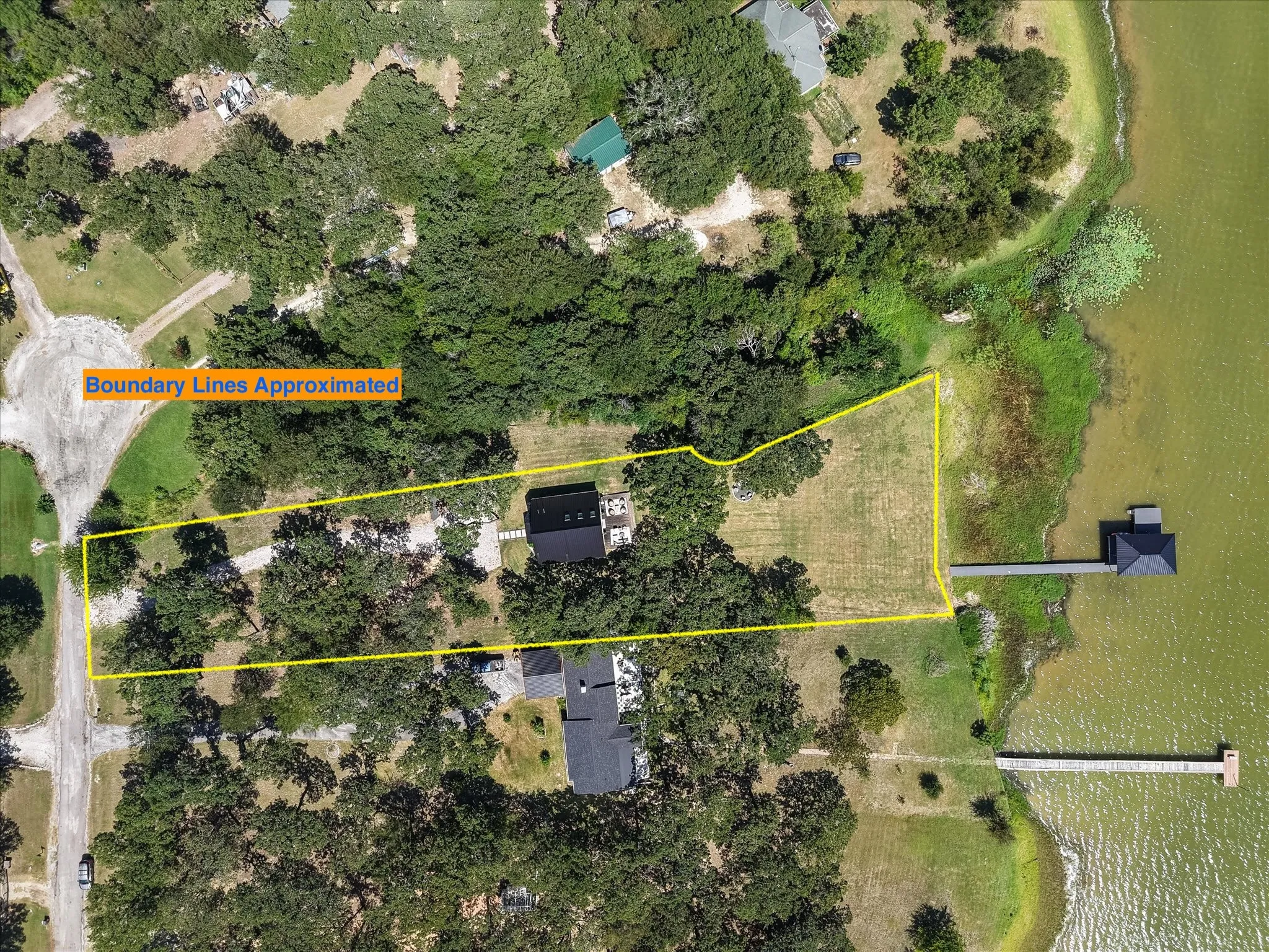Property boundaries illustrate the generous 1.12-acre waterfront homesite.