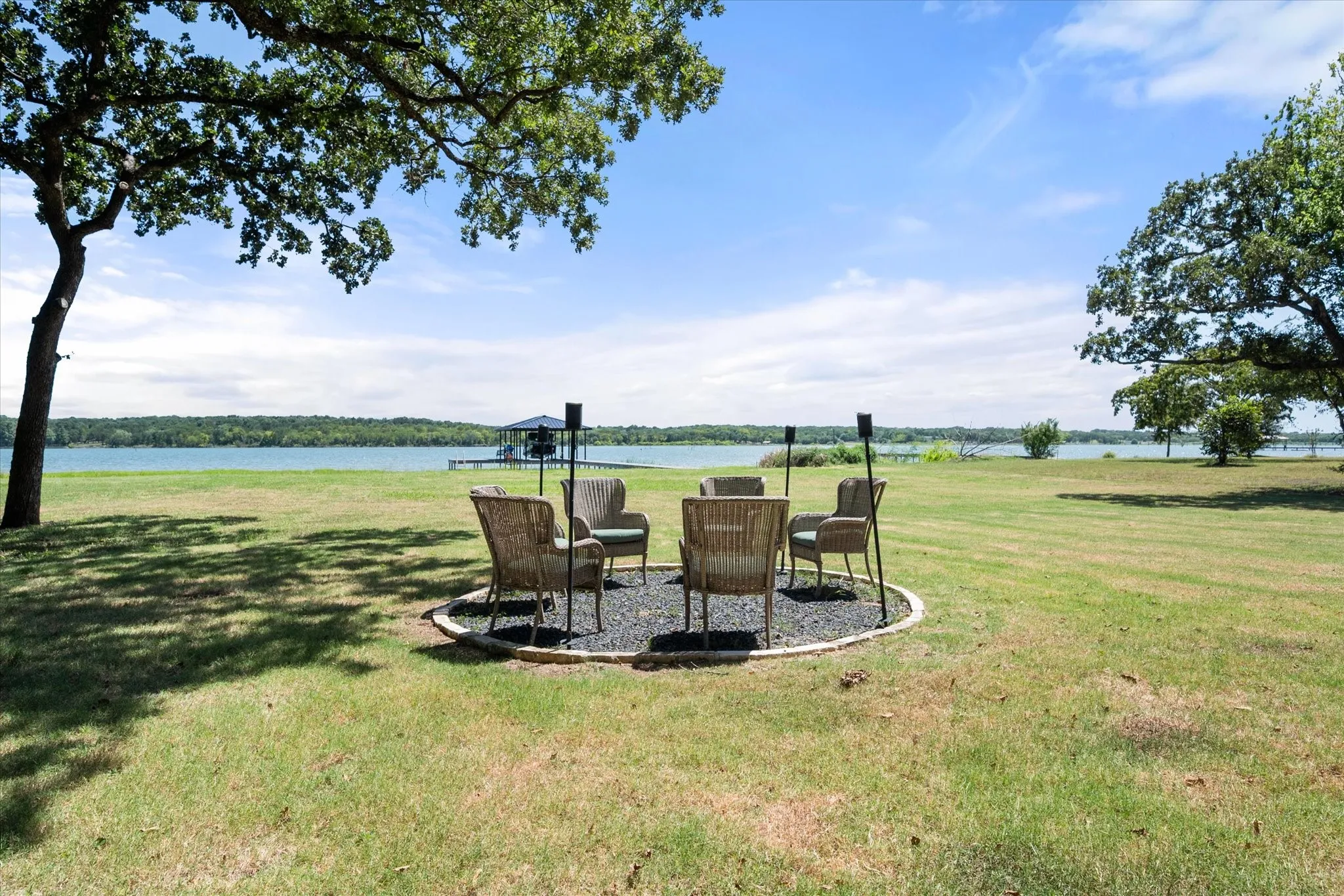 Lakeside seating area invites unforgettable evenings beneath the stars.