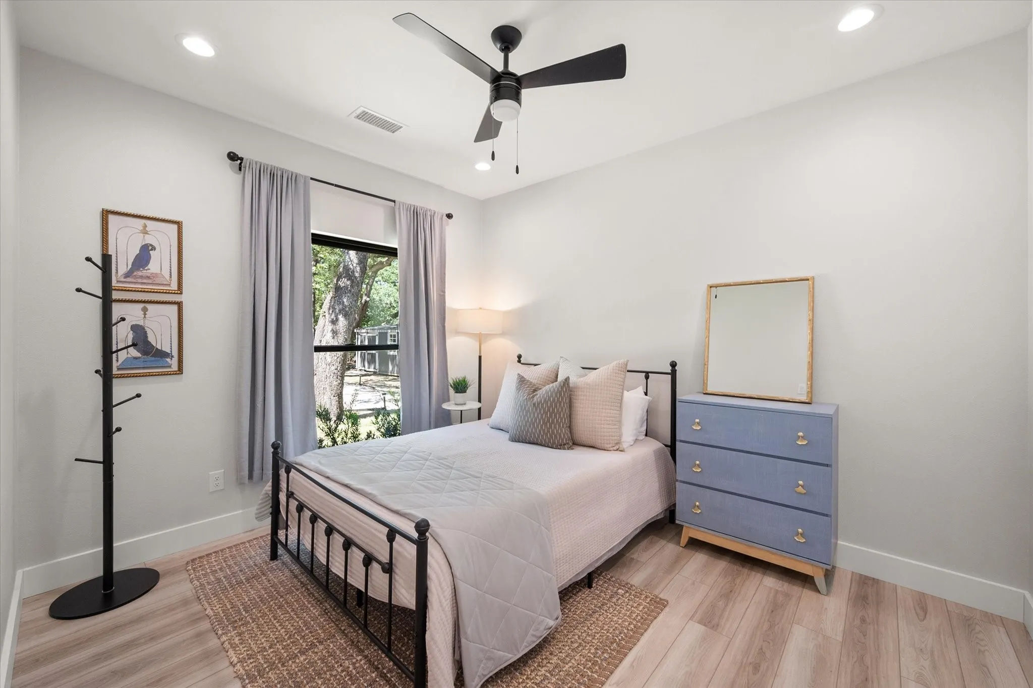 Comfortable guest bedroom provides a peaceful retreat for family and overnight visitors.