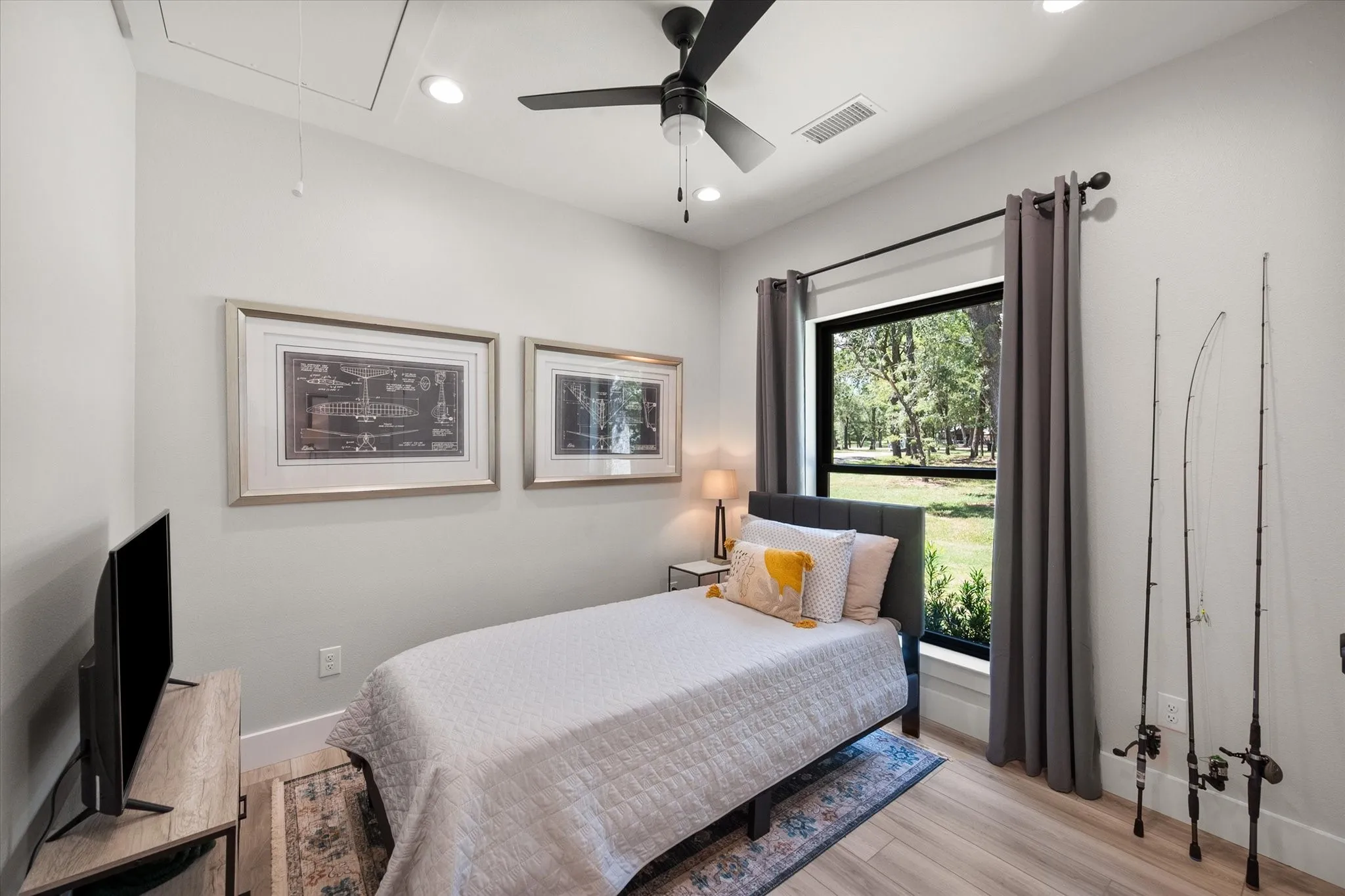 Second guest bedroom creates flexible space for family, guests, or a home office.