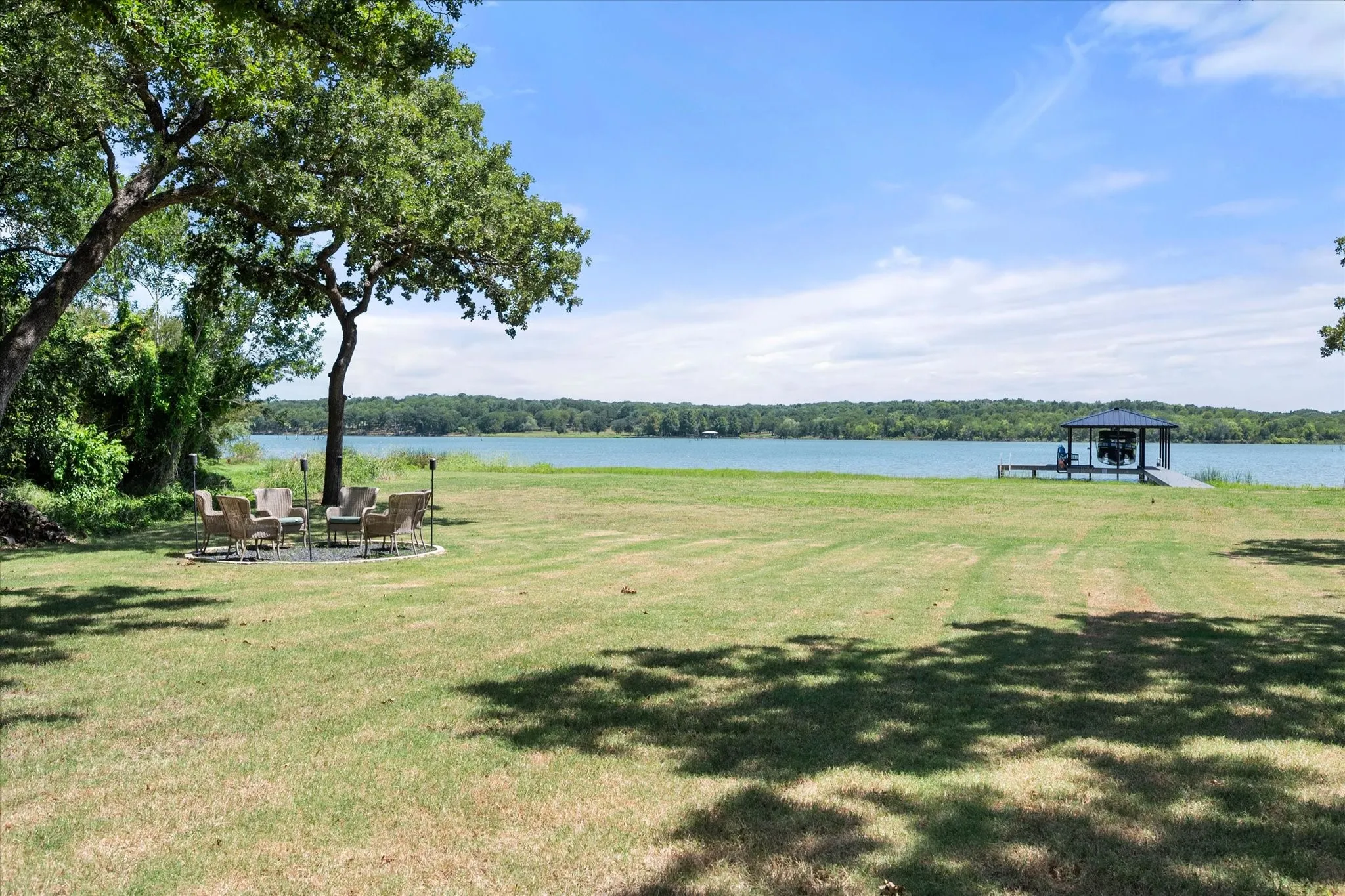 Large backyard provides plenty of room for recreation while enjoying waterfront views.