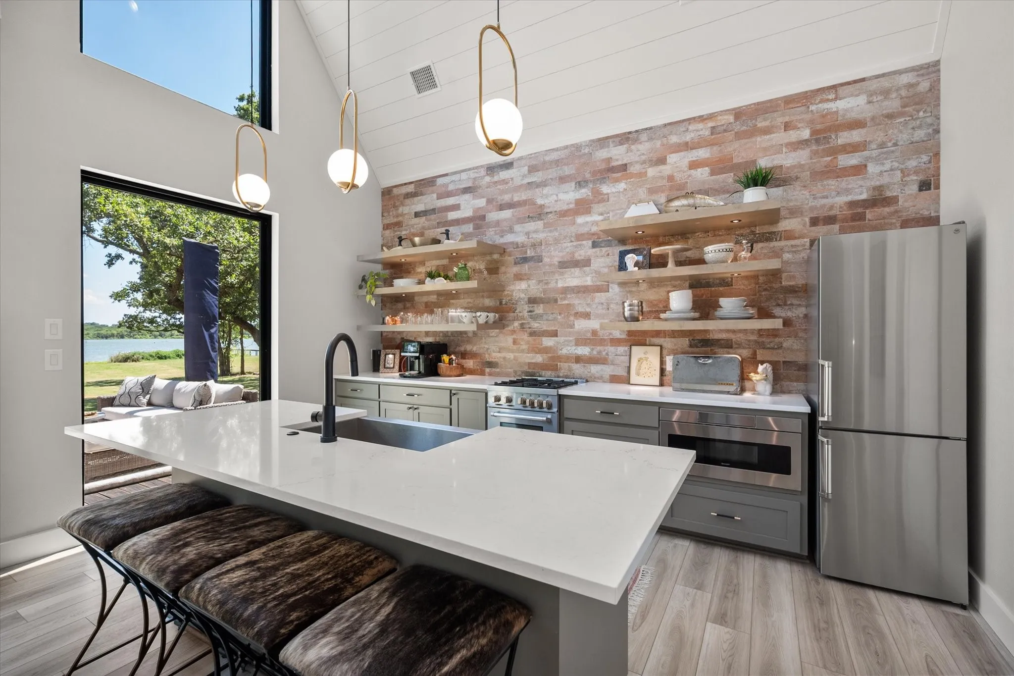 Spacious island offers additional seating for entertaining family and guests.