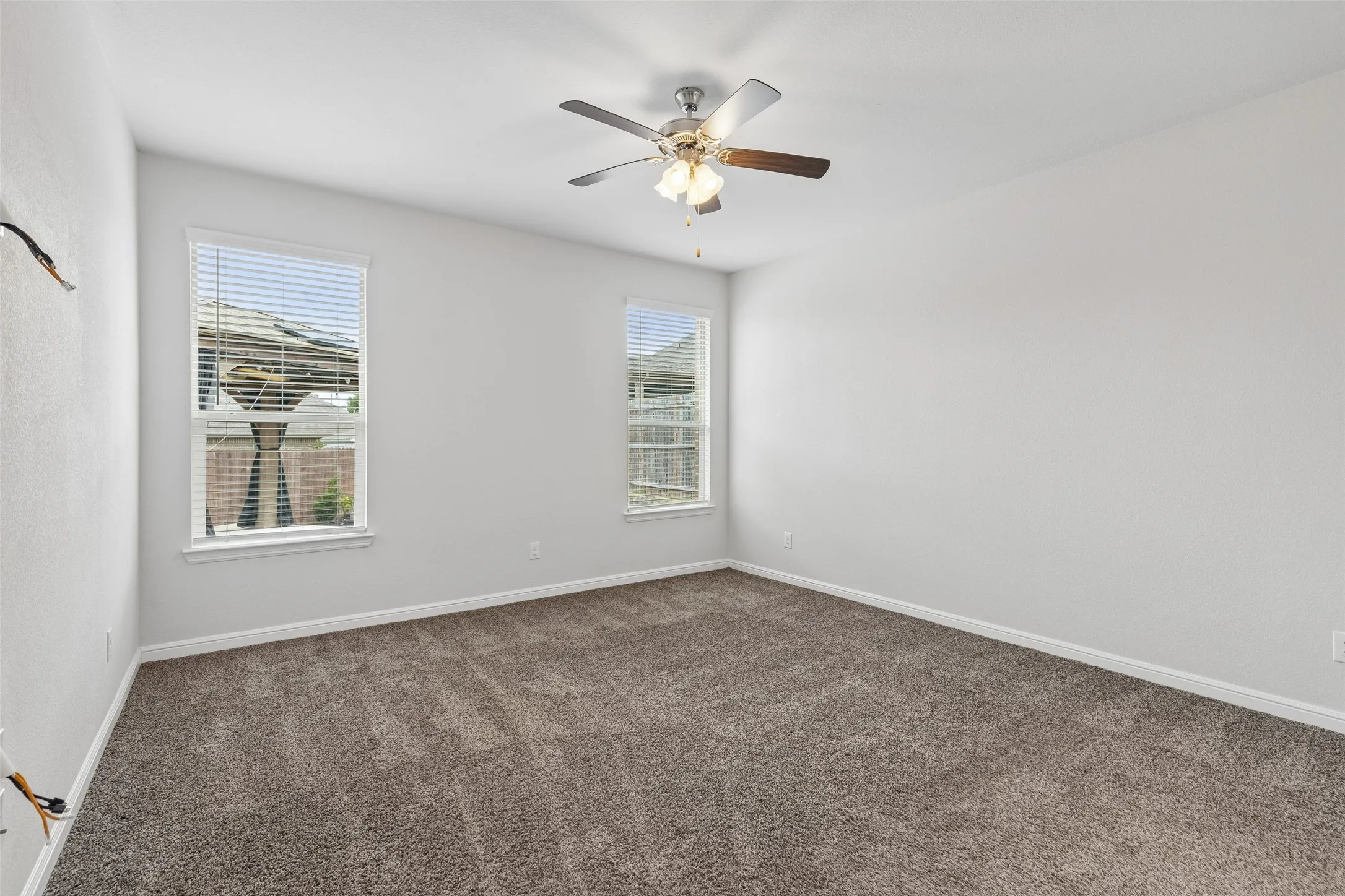 Another view of the primary bedroom.
