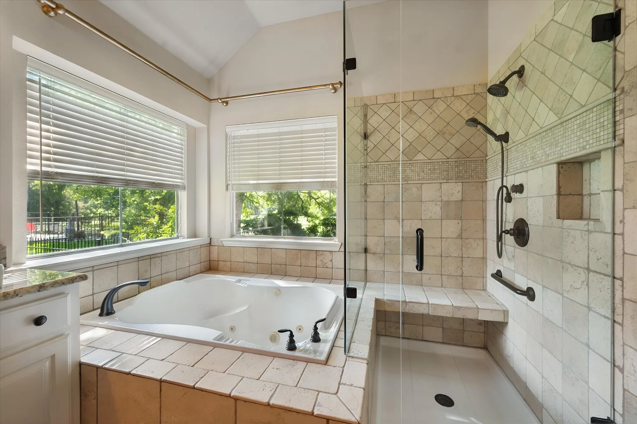 Both shower and tub in primary bathroom