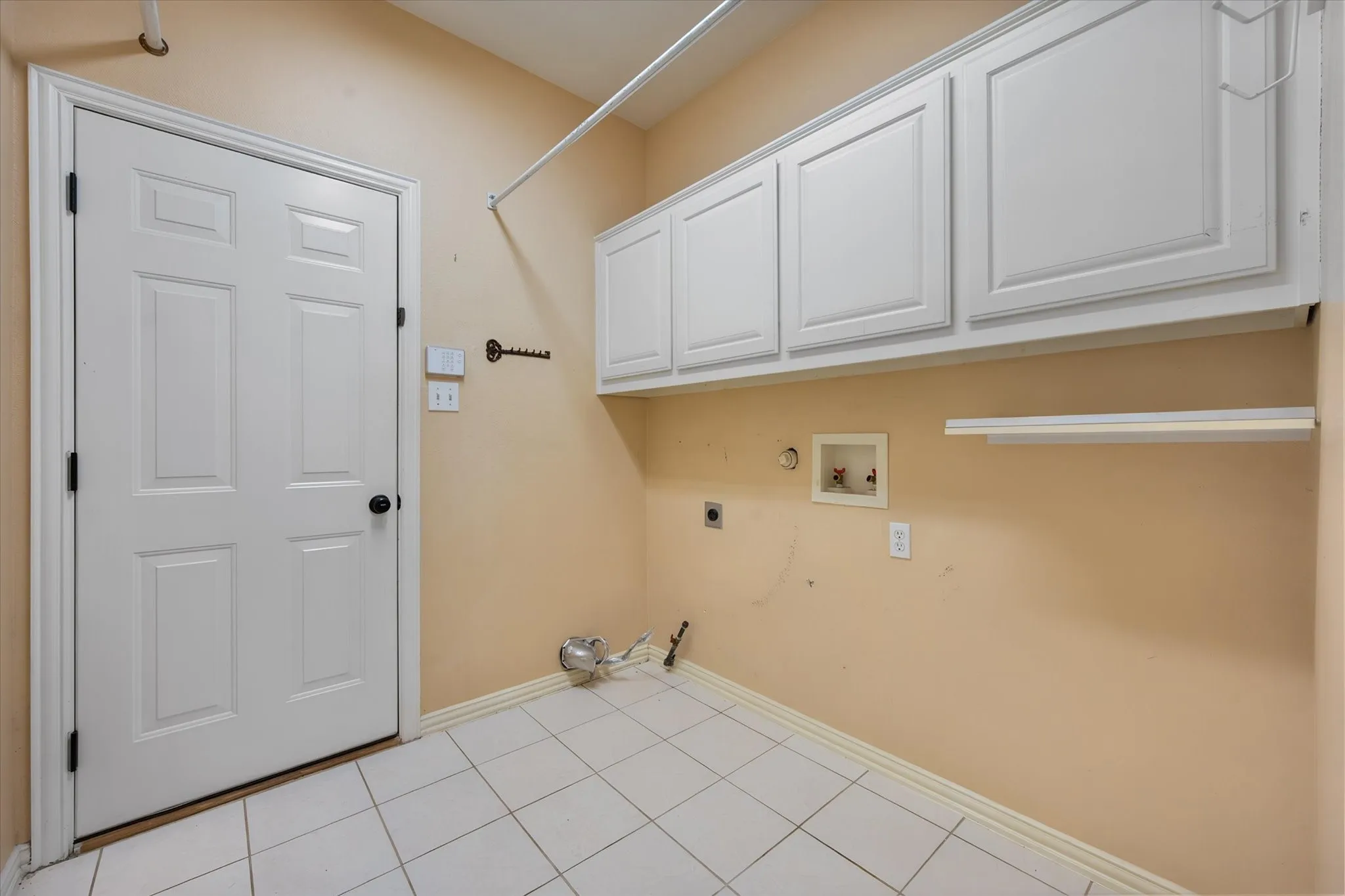 Laundry room with storage
