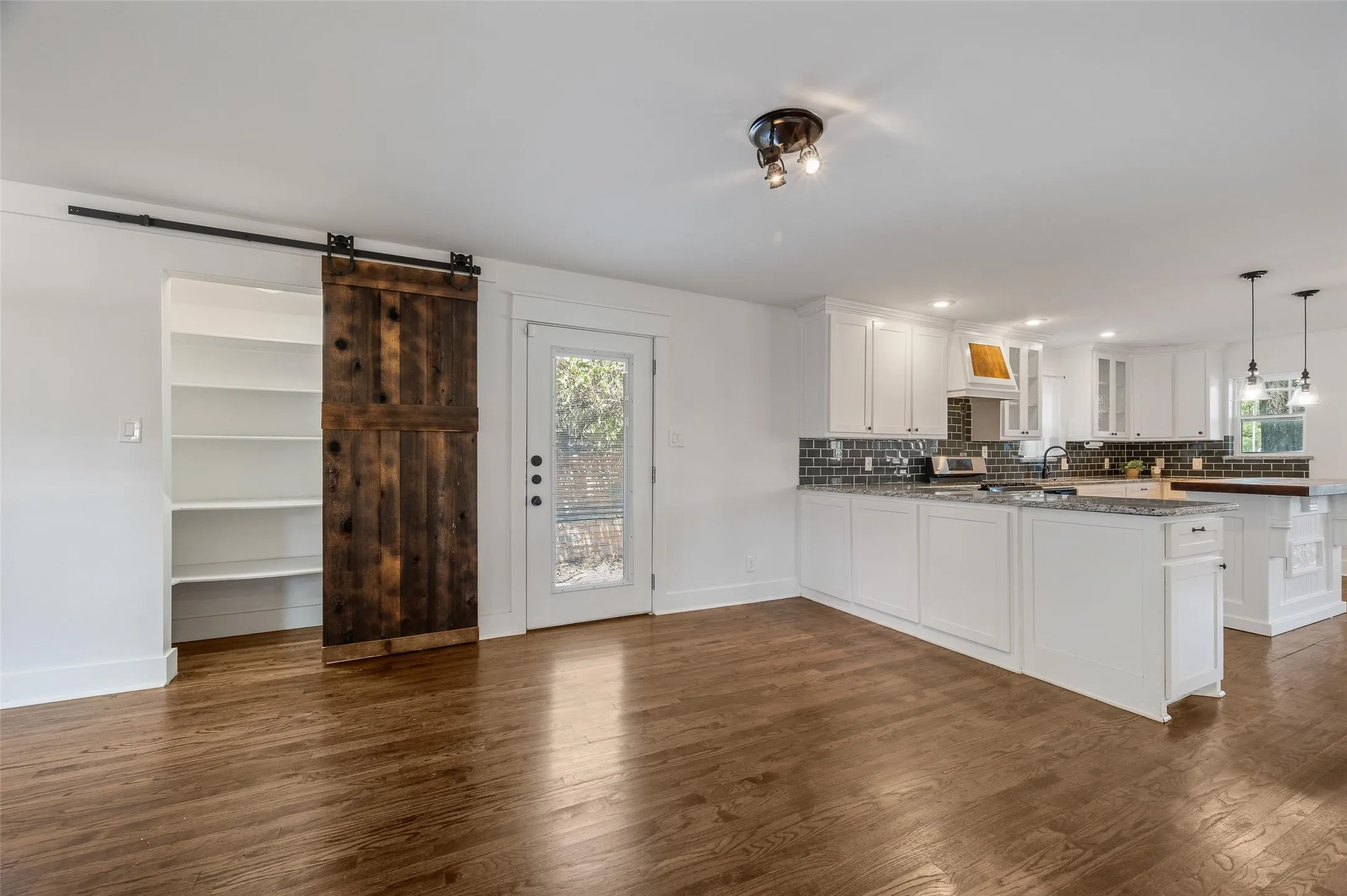 Large pantry with sliding barn door
