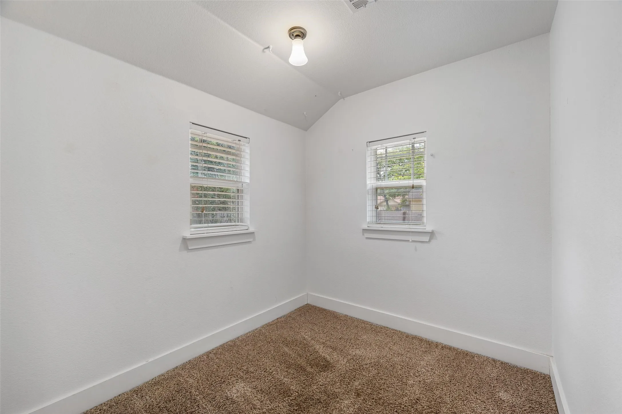 Flex space in the primary suite could be used as an office, nursery, yoga space, reading nook, craft room, anything you want