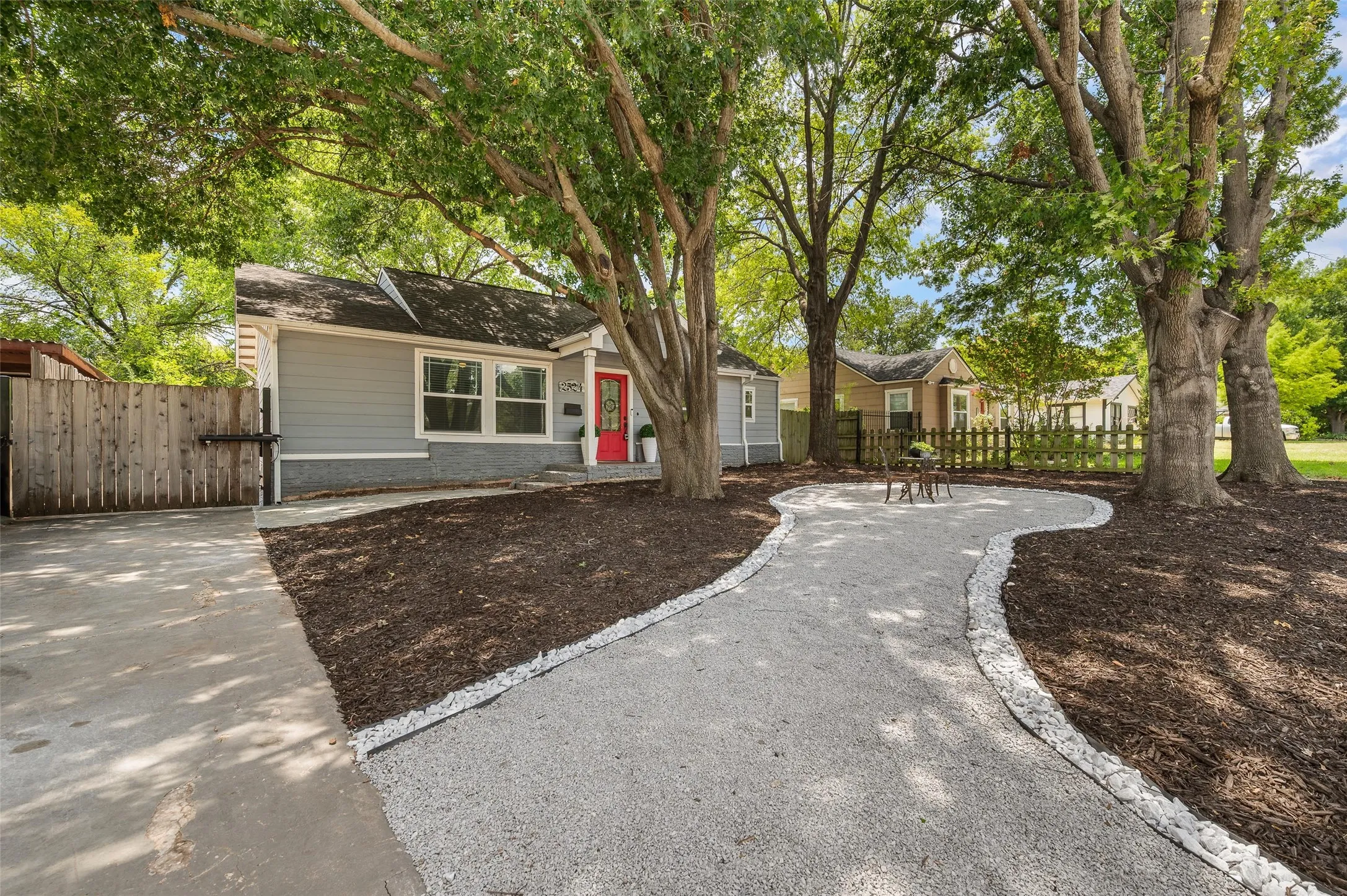 Pathway to your relaxing outdoor retreat under a full tree canopy