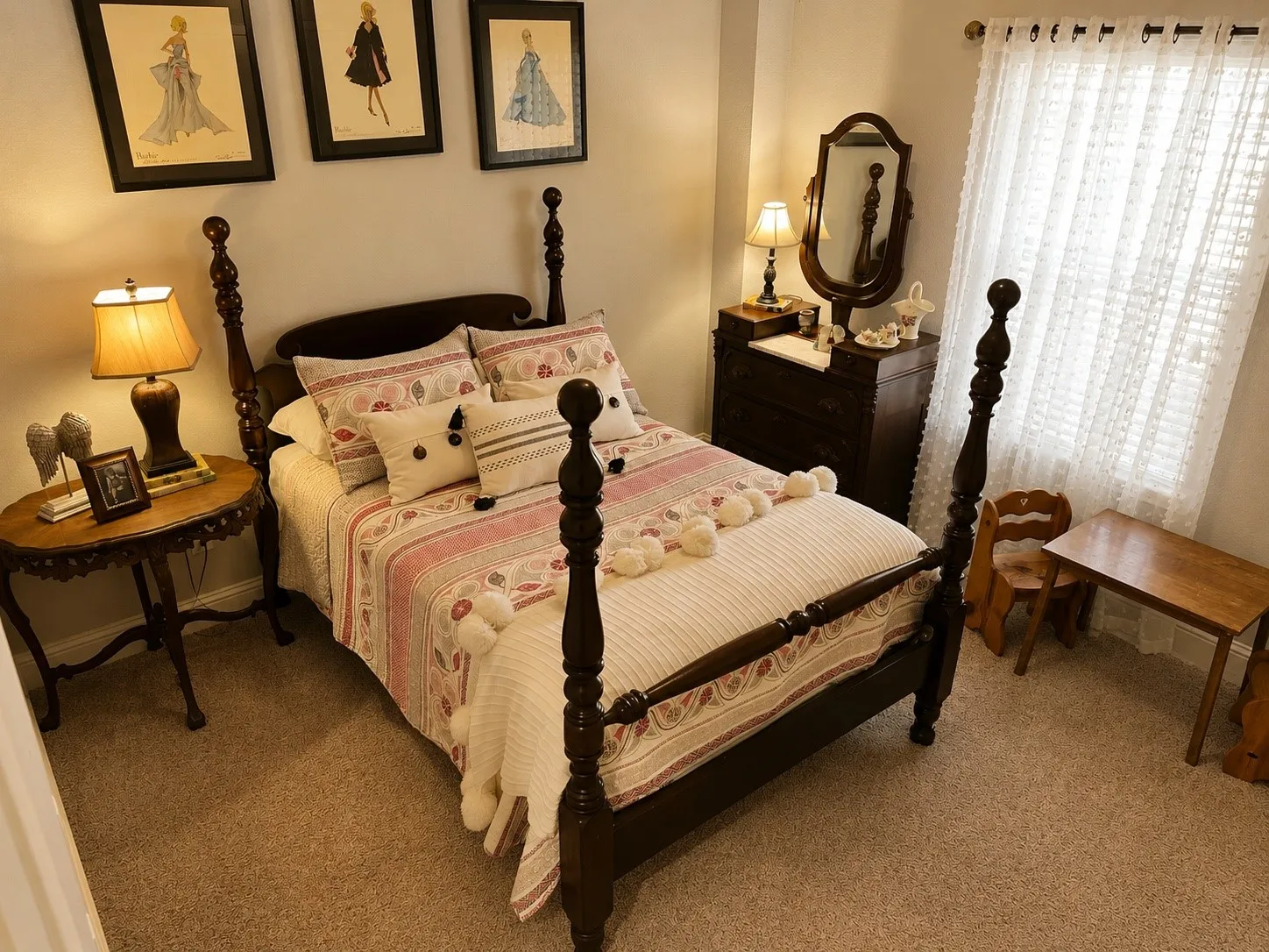 Carpeted bedroom featuring a window with sheer white curtains, a dark wood dresser with an attached mirror, and light-colored wall paint