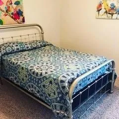 Wall-to-wall carpeting in a neutral tone