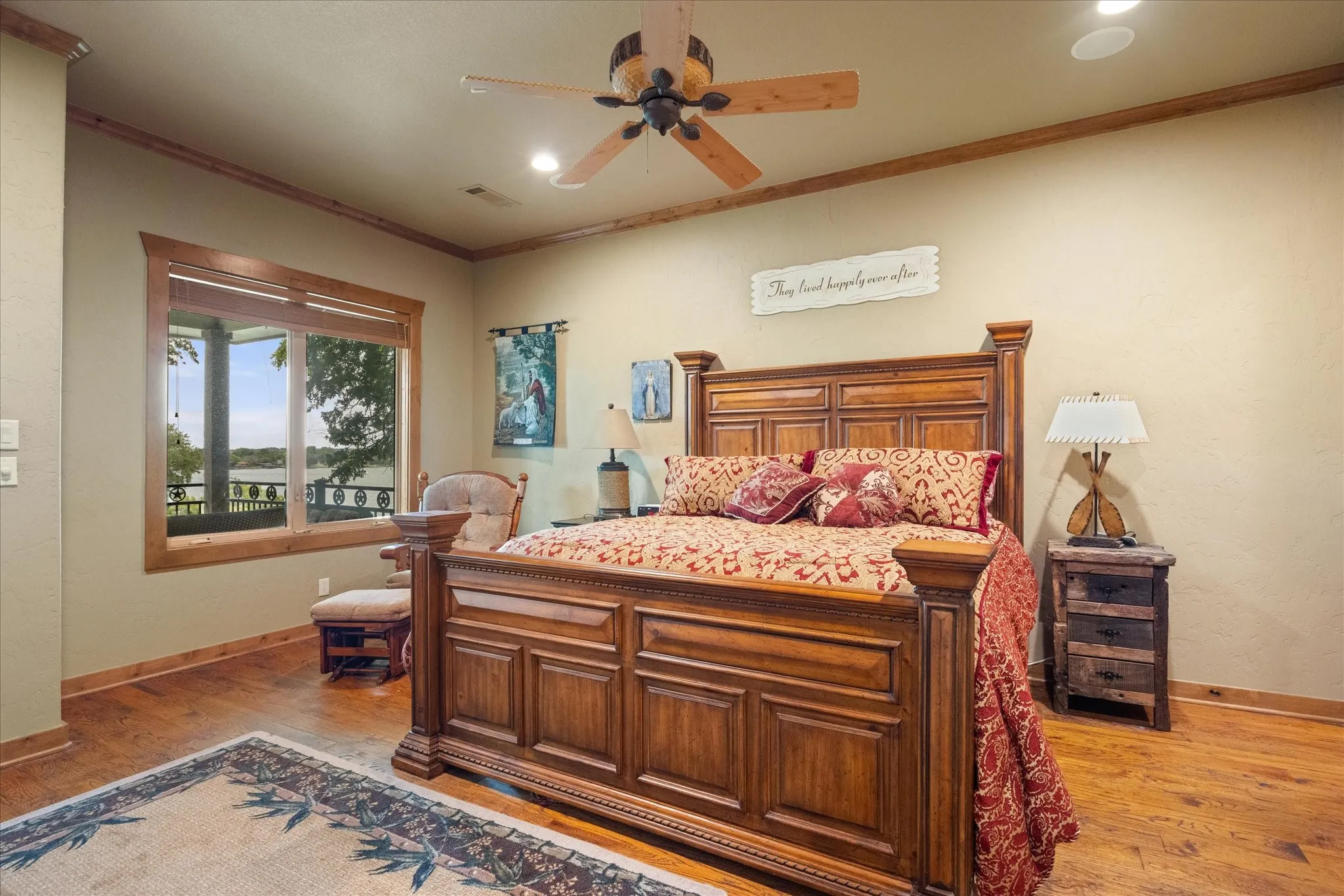 Window with exterior balcony access, wood-finish flooring, recessed ceiling lighting, and a ceiling fan