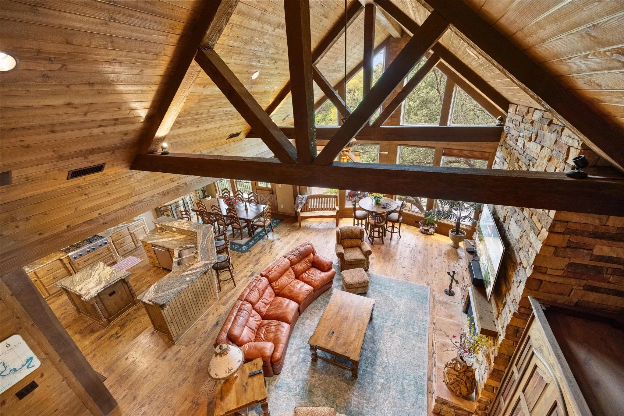 Soaring vaulted ceilings with exposed wood beams