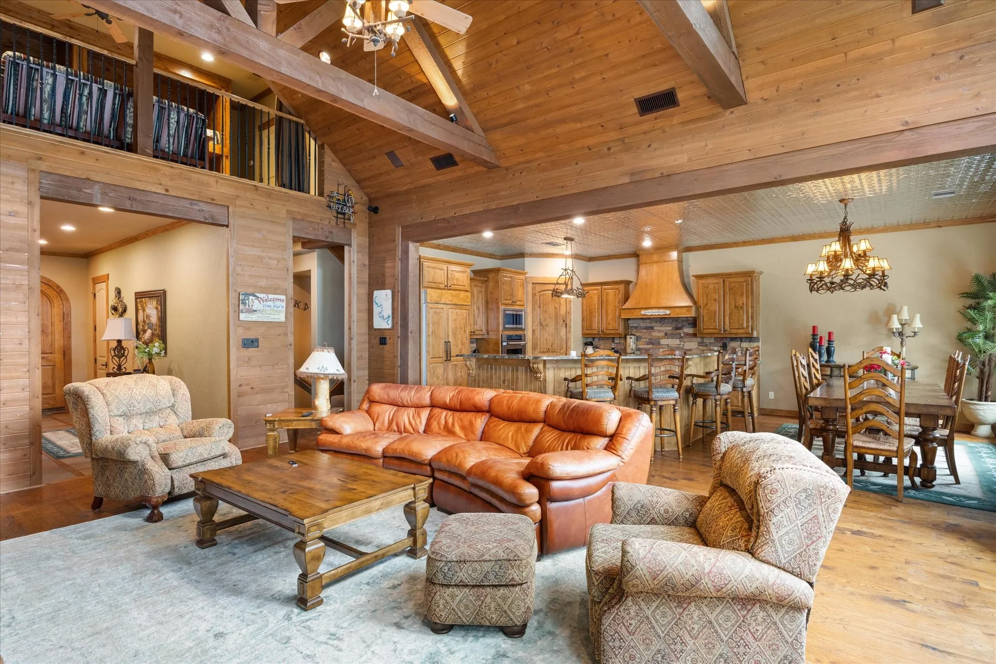 Vaulted wood-paneled ceilings with exposed beams