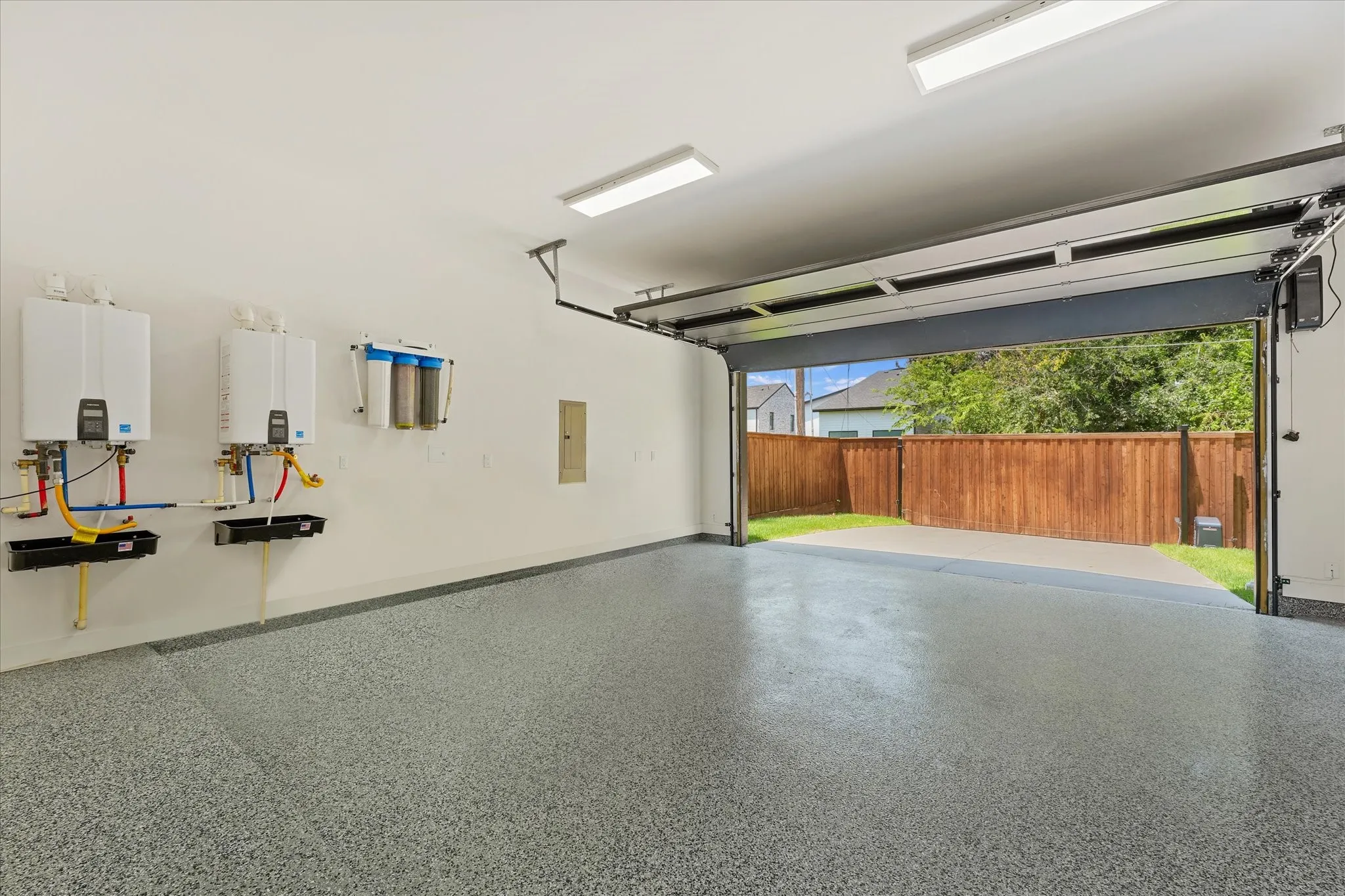 2-car with gated rear entry, Nuvo water filtration system & Navien tankless hotwater heaters