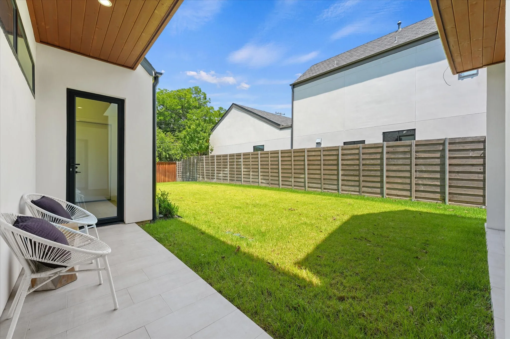 Backyard facing door to mudroom