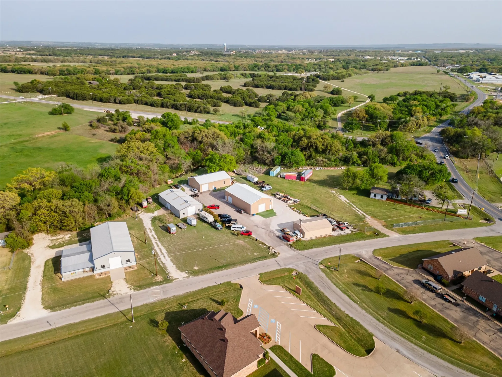 Aerial view shows property just off of Fall Creek Hwy in Acton, TX