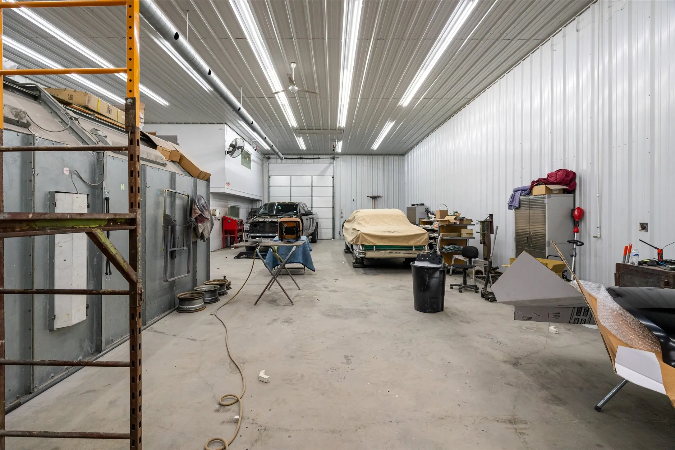 40 x 70 Building with upstairs and downstairs offices and a bathroom. Heat and air conditioning.