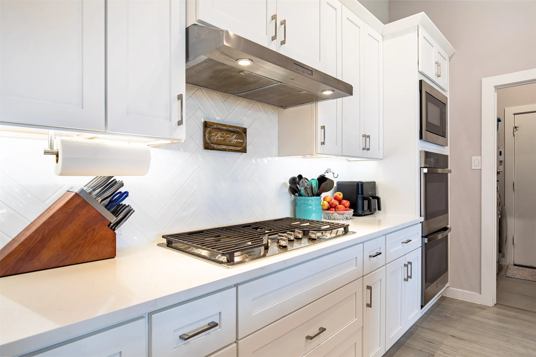 Kitchen with gas cooktop.