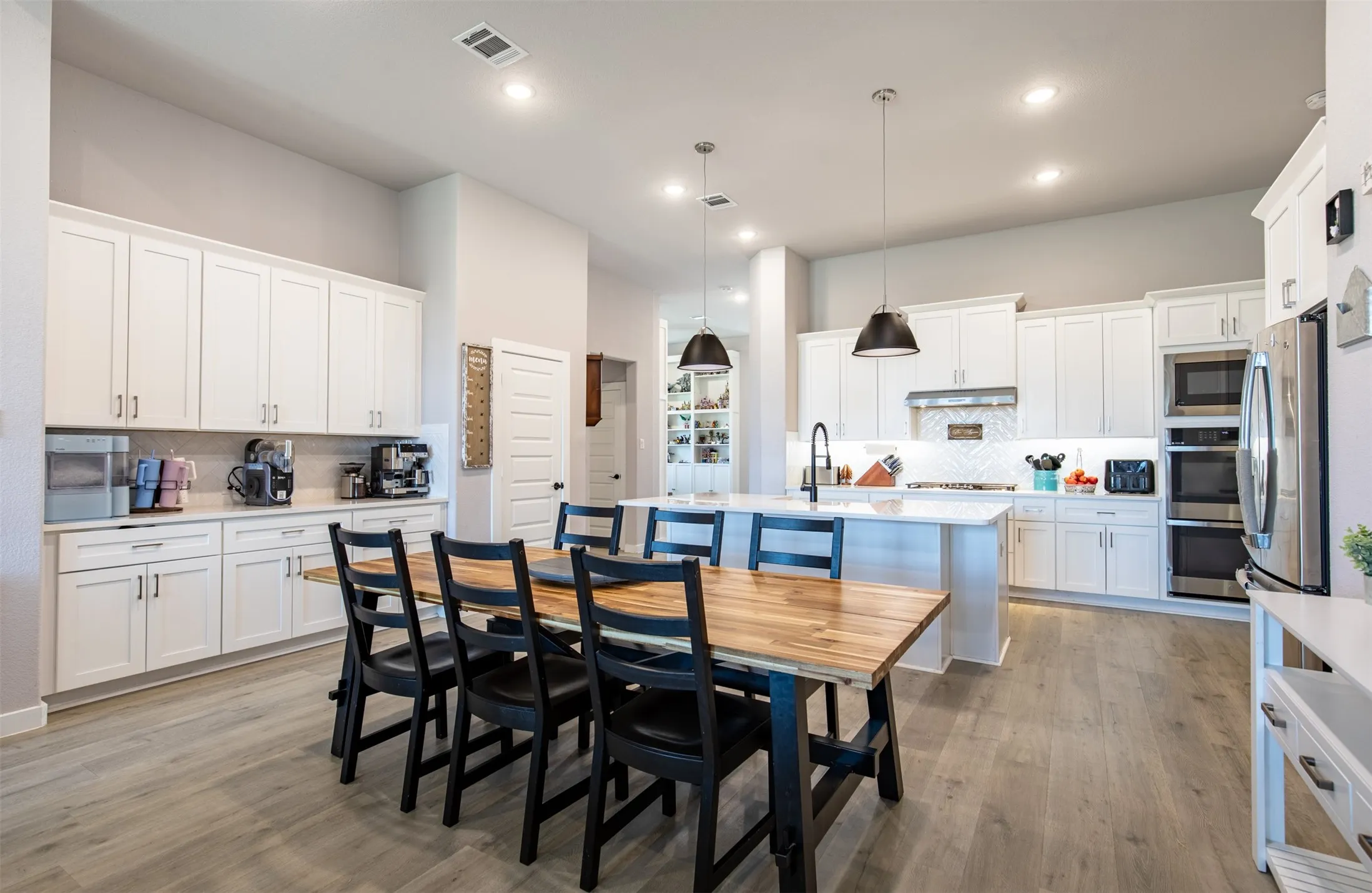 Dining room with built-ins and serving area.