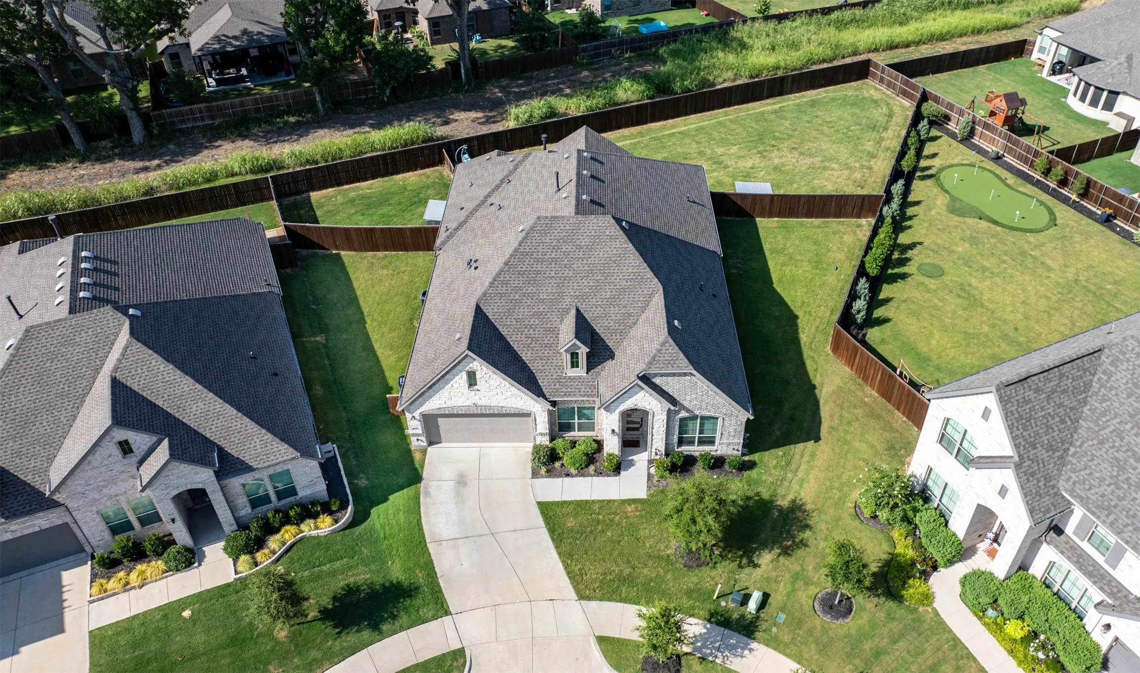 Aerial view of home and lot.