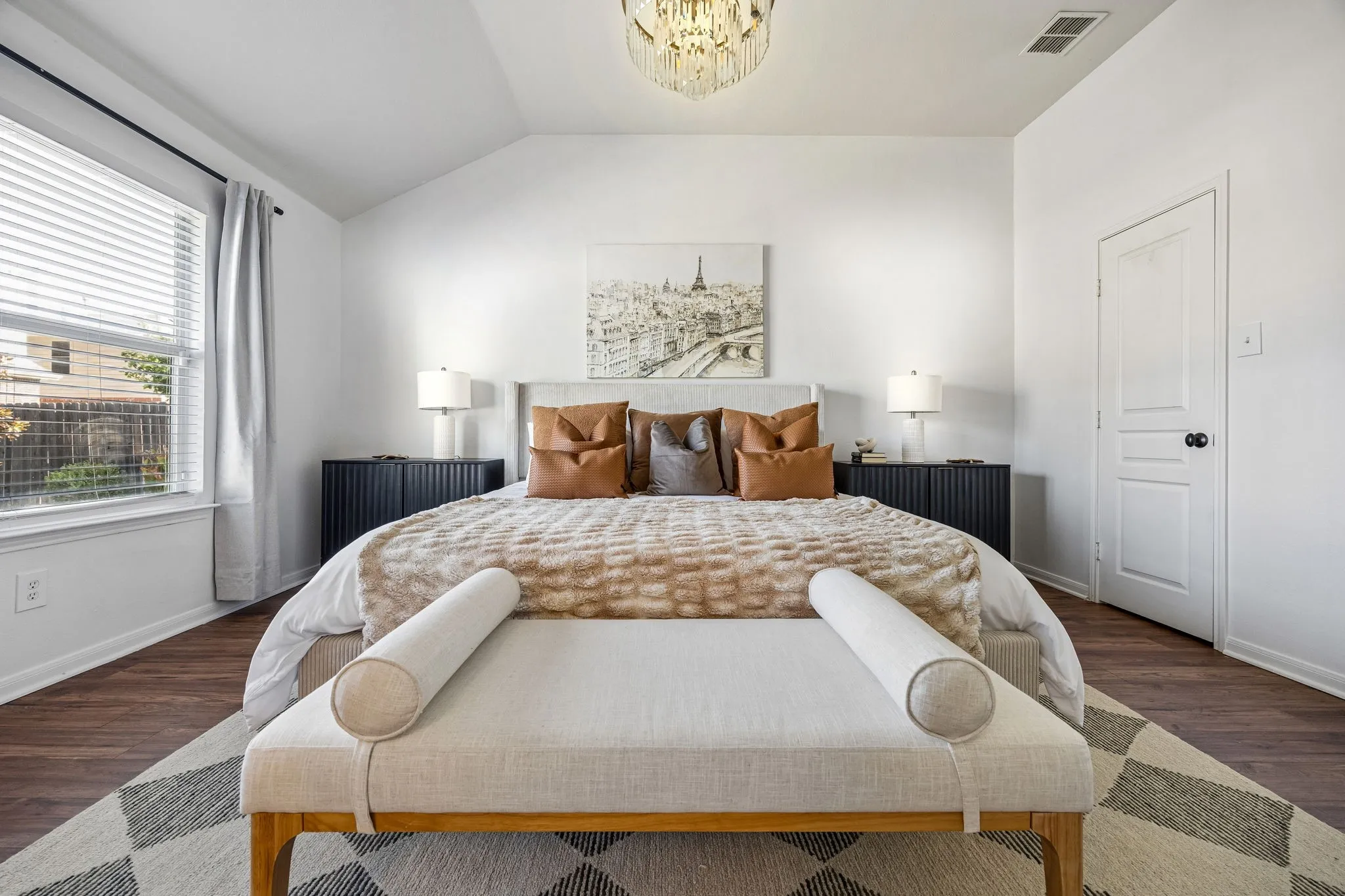 The primary suite serves as a true retreat, with the added convenience of his-and-hers separate closets.
