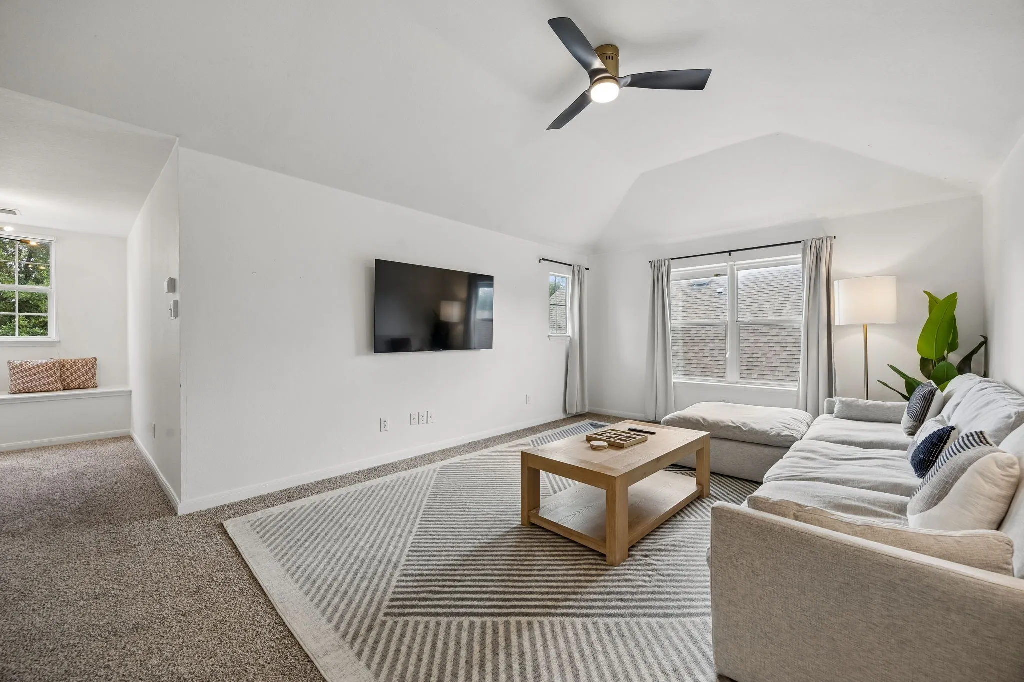 2nd floor living is open and bright.
